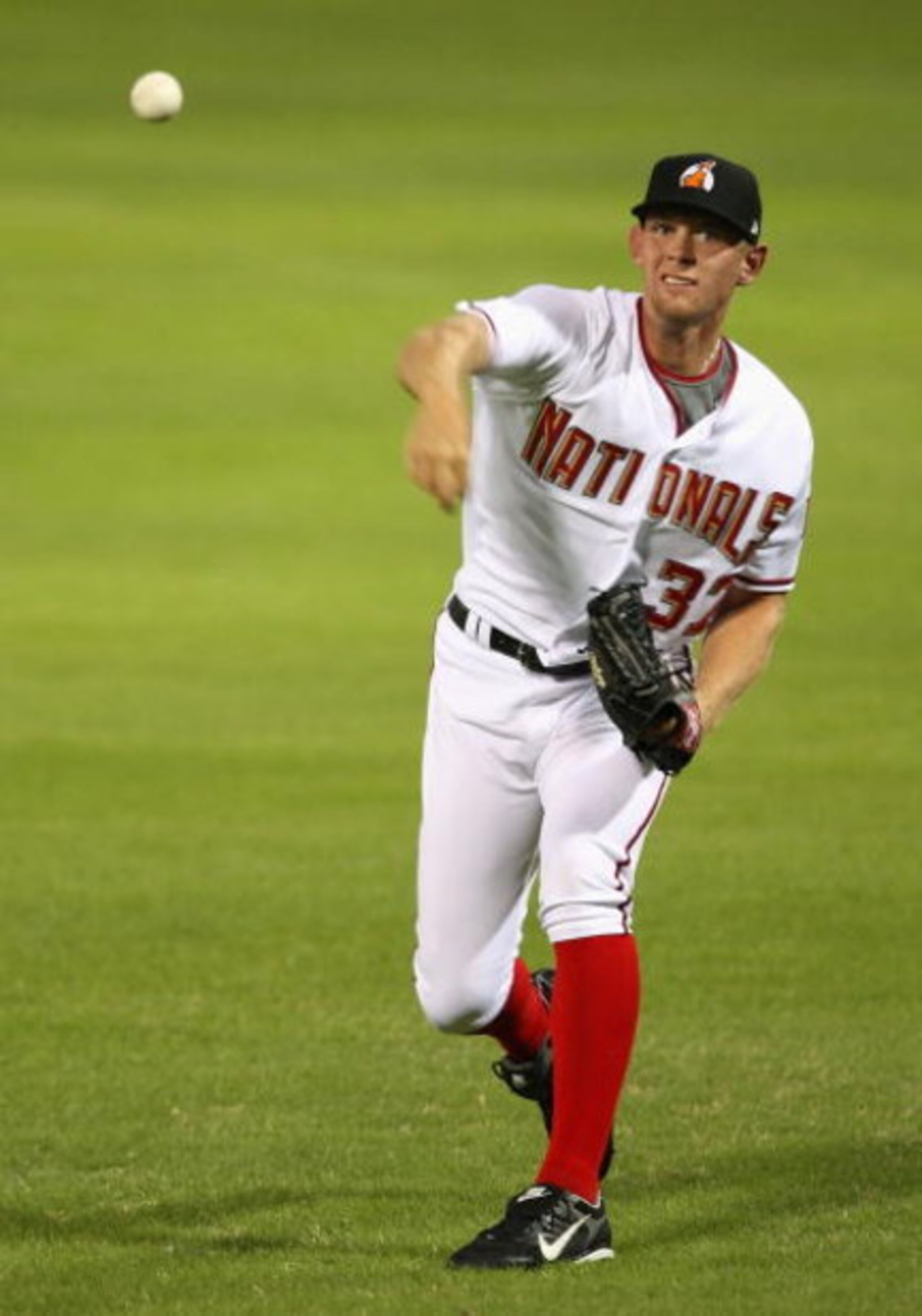 PHOENIX - OCTOBER 16:  Washington Nationals prospect Stephen Strasburg #37, playing for the Phoenix Desert Dogs, warms up before the Arizona Fall League game against the Scottsdale Scorpions at Phoenix Municipal Stadium on October 16, 2009 in Phoenix, Ari