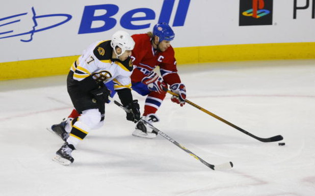 MONTREAL, CANADA- APRIL 17:  Alex Kovalev #27 of the Montreal Canadiens skates with the puck against Milan Lucic #17 of the Boston Bruins during game five of the 2008 NHL Stanley Cup Playoffs Eastern Conference Quarter-Finals series on April 17, 2008 at t