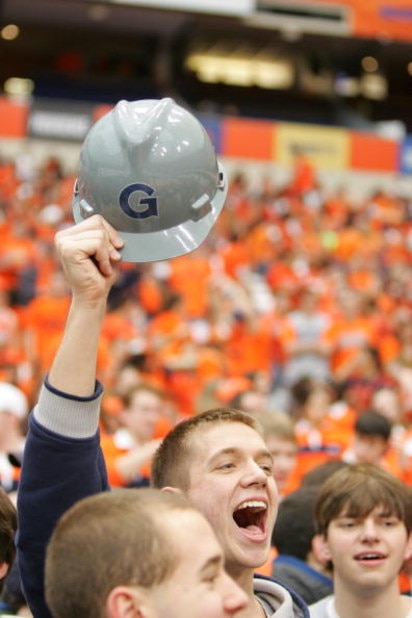 SYRACUSE, NY - FEBRUARY 16:  A Georgetown fan cheers for the Hoyas during the game between the Georgetown University Hoyas and the Syracuse University Orange at the Carrier Dome February 16, 2008 in Syracuse, New York. (Photo by Marc Squire/Getty Images)