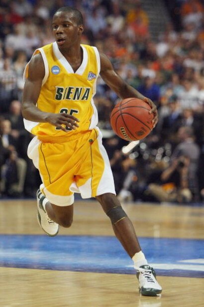 TAMPA, FL - MARCH 21: Ronald Moore #25 of the Siena Saints brings to ball up court during his team's 75-69 win over the Vanderbilt Commodores in the first round of the 2008 NCAA Tournament Midwest Regional at the St. Pete Times Forum on March 21, 2008 in 