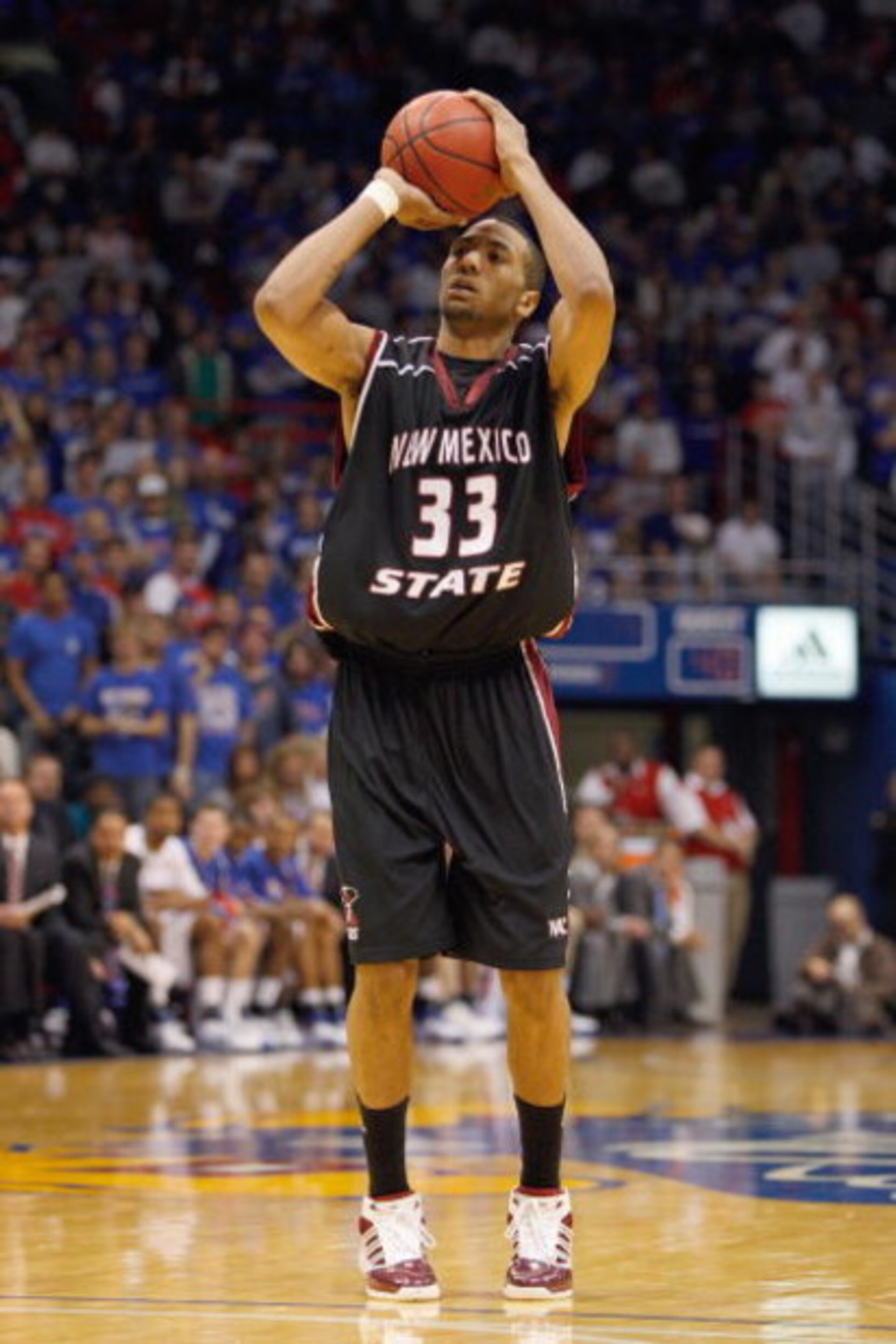 LAWRENCE, KS - DECEMBER 3:  Troy Gillenwater #33 of the New Mexico State Aggies makes a free throw during the game against the Kansas Jayhawks on December 3, 2008 at Allen Fieldhouse in Lawrence, Kansas. (Photo by Jamie Squire/Getty Images)