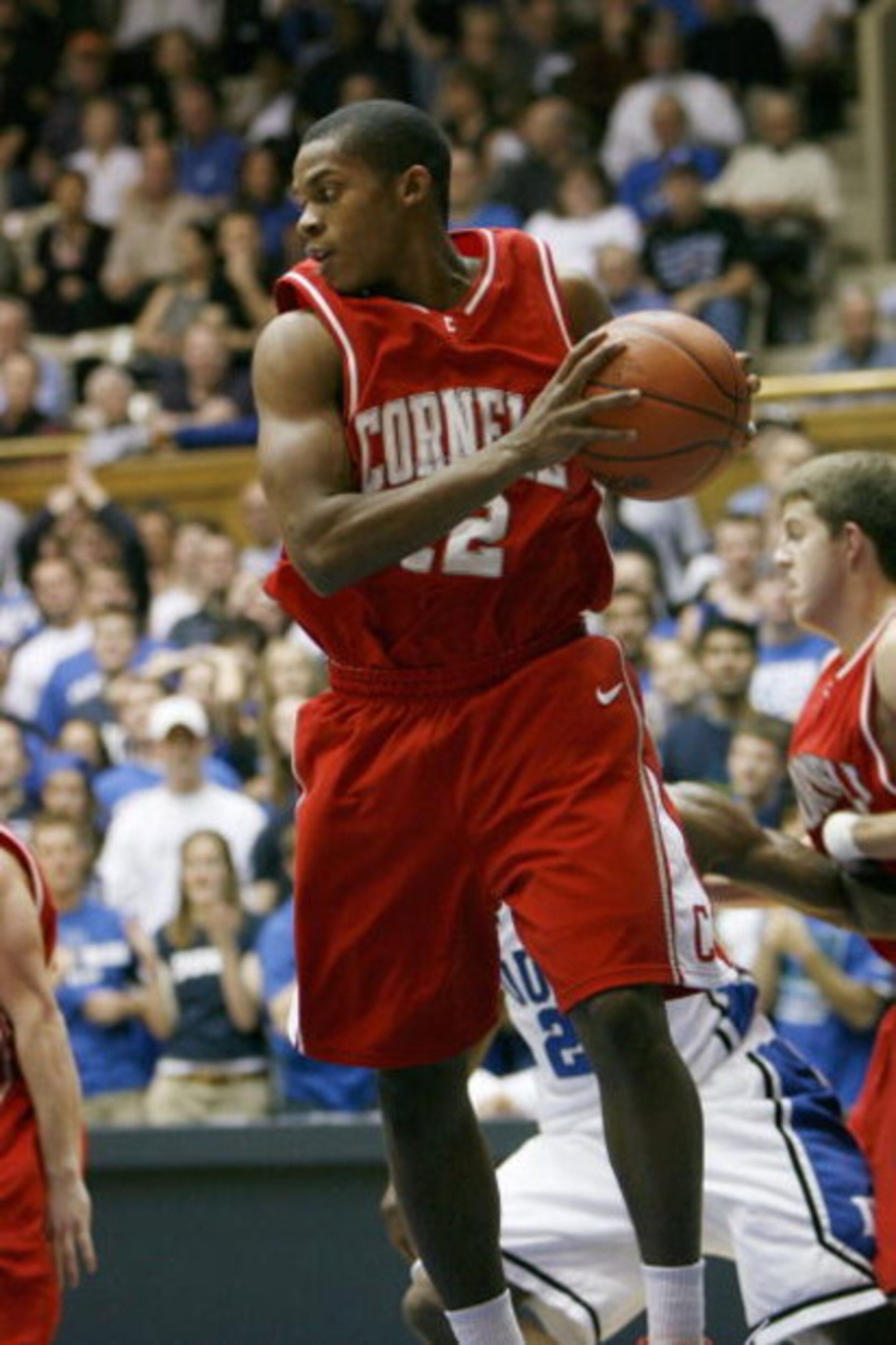 DURHAM - JANUARY 6:  Louis  Dale #12 of Cornell Big Red looks to move the ball during the college basketball game against the Duke Blue Devils at Cameron Indoor Stadium on January 6, 2008 in Durham, North Carolina. (Photo by Kevin C. Cox/Getty Images)