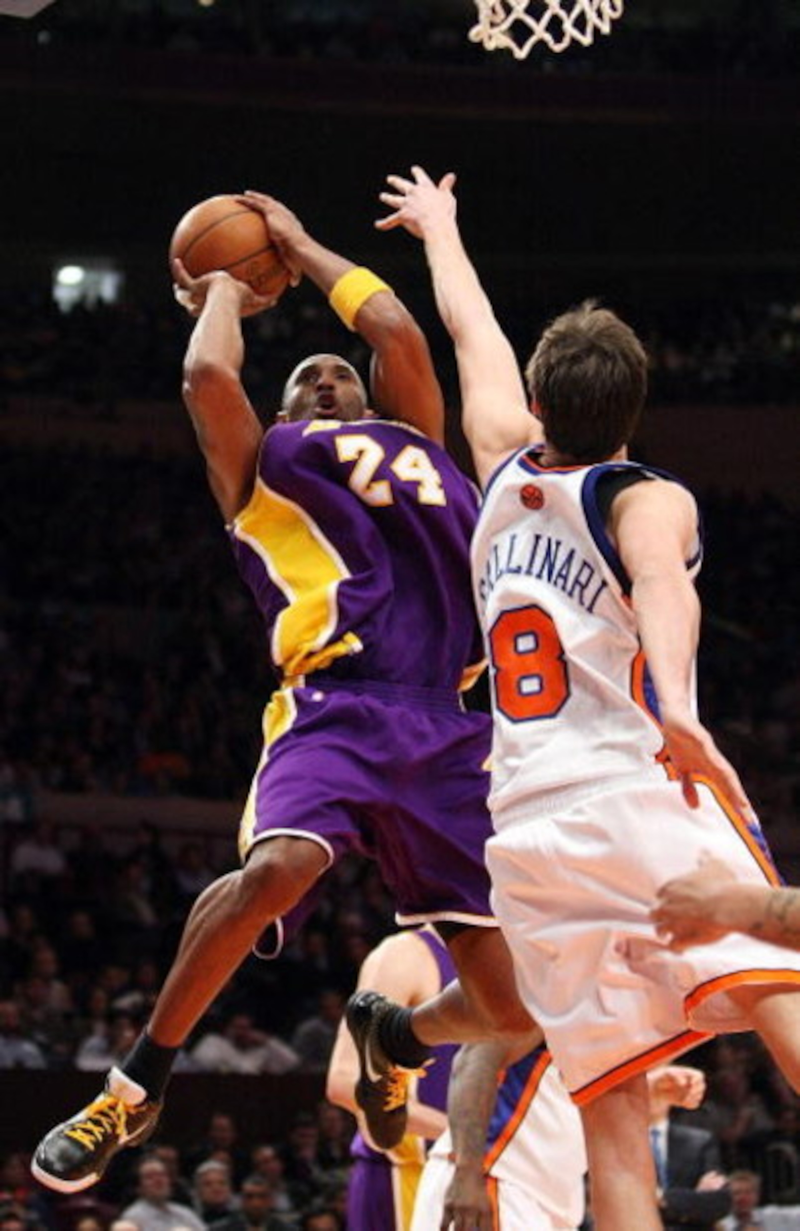 NEW YORK - FEBRUARY 02:  Kobe Bryant #24 of the Los Angeles Lakers shoots the ball over Danilo Gallinari #8 of the New York Knicks on February 2, 2009 at Madison Square Garden in New York City. NOTE TO USER: User expressly acknowledges and agrees that, by