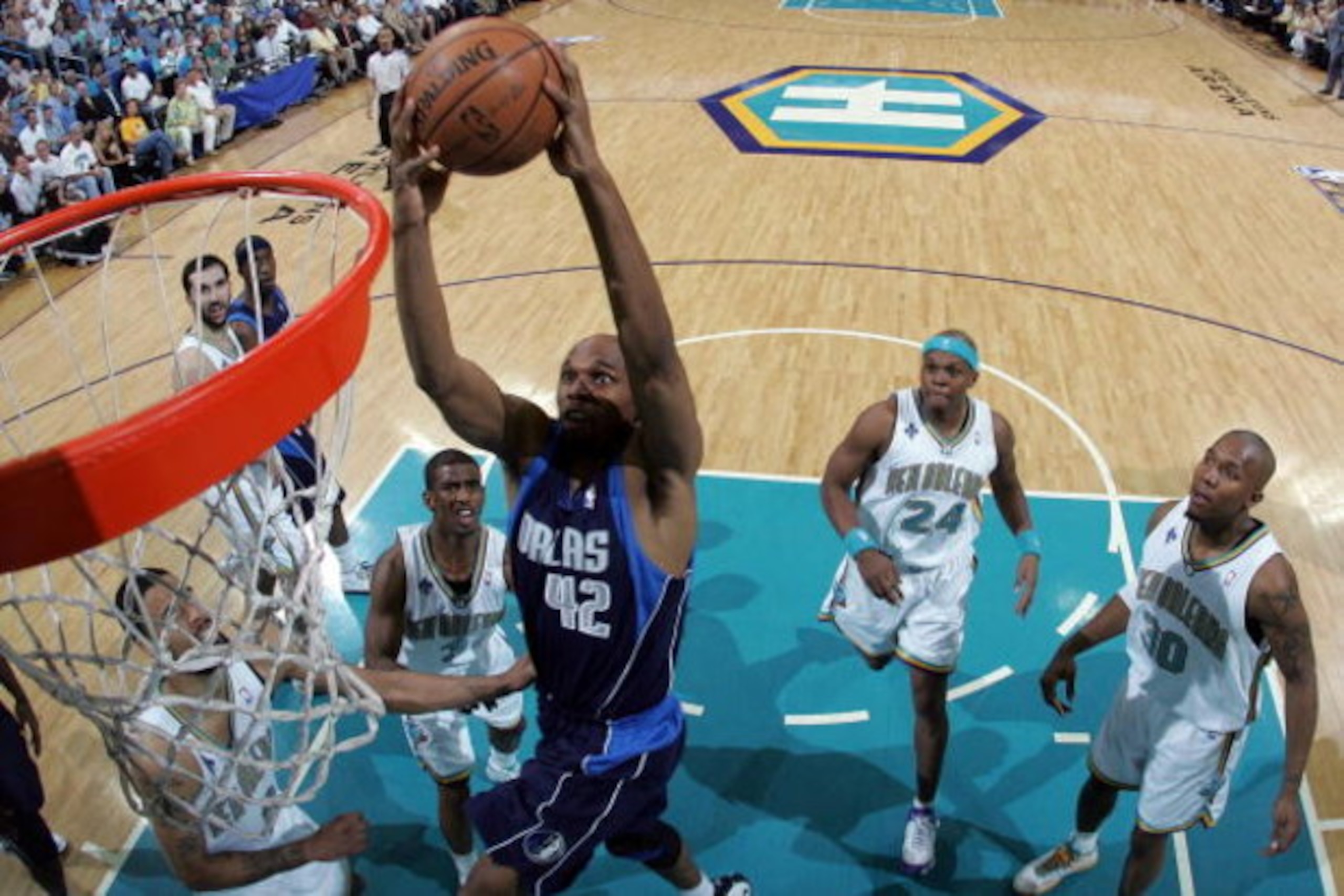 NEW ORLEANS - APRIL 29:  Jerry Stackhouse #42 of the Dallas Mavericks dunks the ball over Tyson Chandler #6 of the New Orleans Hornets in Game Five of the Western Conference Quarterfinals during the 2008 NBA Playoffs at The New Orleans Arena April 29, 200