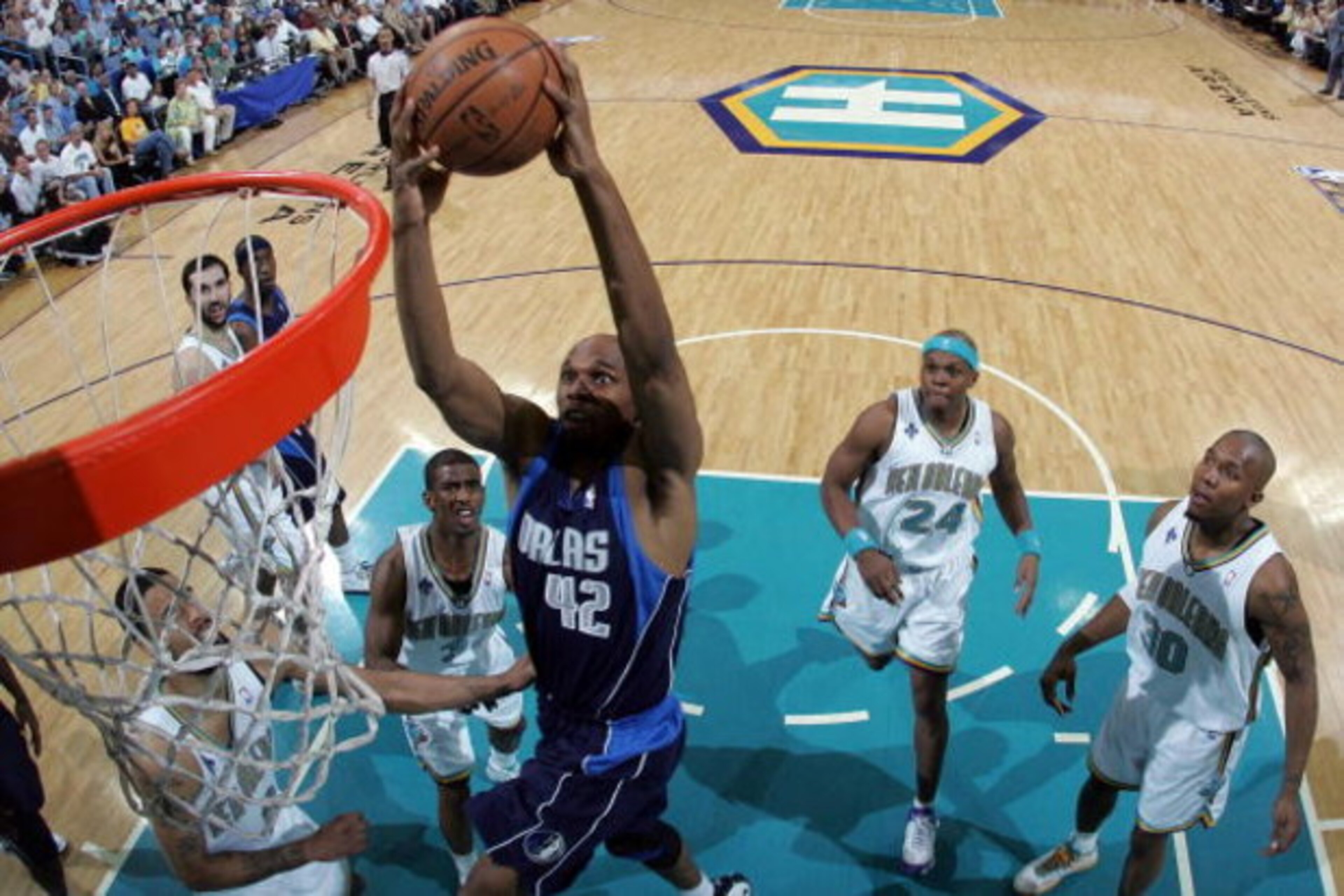 NEW ORLEANS - APRIL 29:  Jerry Stackhouse #42 of the Dallas Mavericks dunks the ball over Tyson Chandler #6 of the New Orleans Hornets in Game Five of the Western Conference Quarterfinals during the 2008 NBA Playoffs at The New Orleans Arena April 29, 200