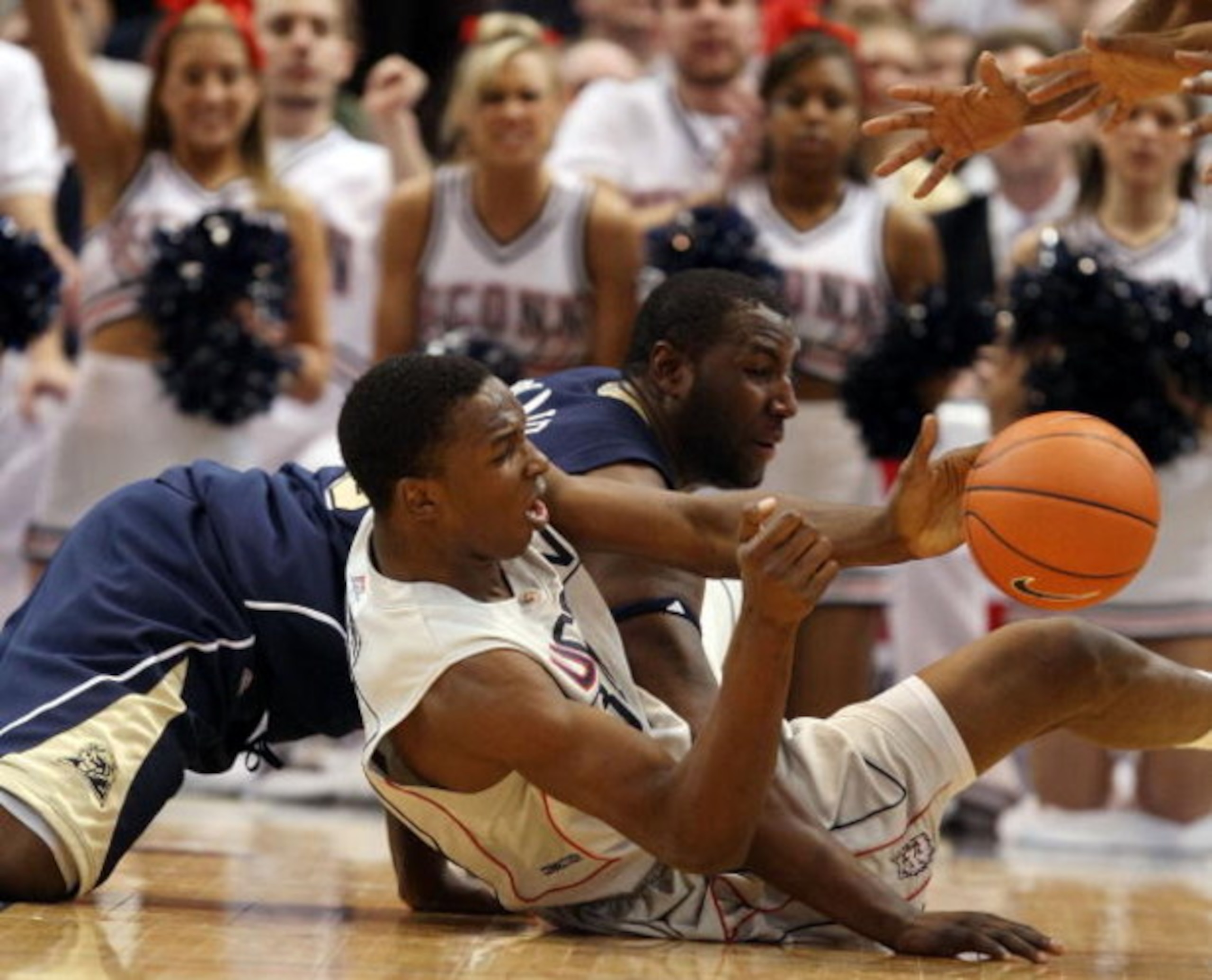 HARTFORD, CT - FEBRUARY 16: Hasheem Thabeet #34 of the Connecticut Huskies and DeJuan Blair #45 of the Pittsburgh Panthers fight for the loose ball on February 16, 2009 at XL Center in Hartford, Connecticut. (Photo by Elsa/Getty Images) HARTFORD, CT - FEBRUARY 16: Hasheem Thabeet #34 of the Connecticut Huskies and DeJuan Blair #45 of the Pittsburgh Panthers fight for the loose ball on February 16, 2009 at XL Center in Hartford, Connecticut. (Photo by Elsa/Getty Images)