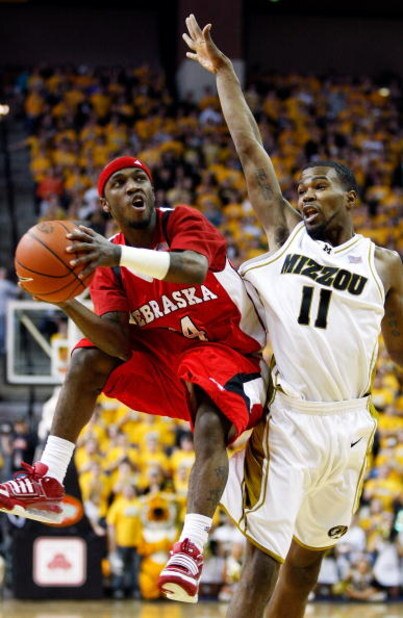 COLUMBIA, MO - FEBRUARY 14:  Cookie Miller #24 of the Nebraska Cornhuskers shoots as Zaire Taylor #11 of the Missouri Tigers defends during the game on February 14, 2009 at Mizzou Arena in Columbia, Missouri.  (Photo by Jamie Squire/Getty Images)
