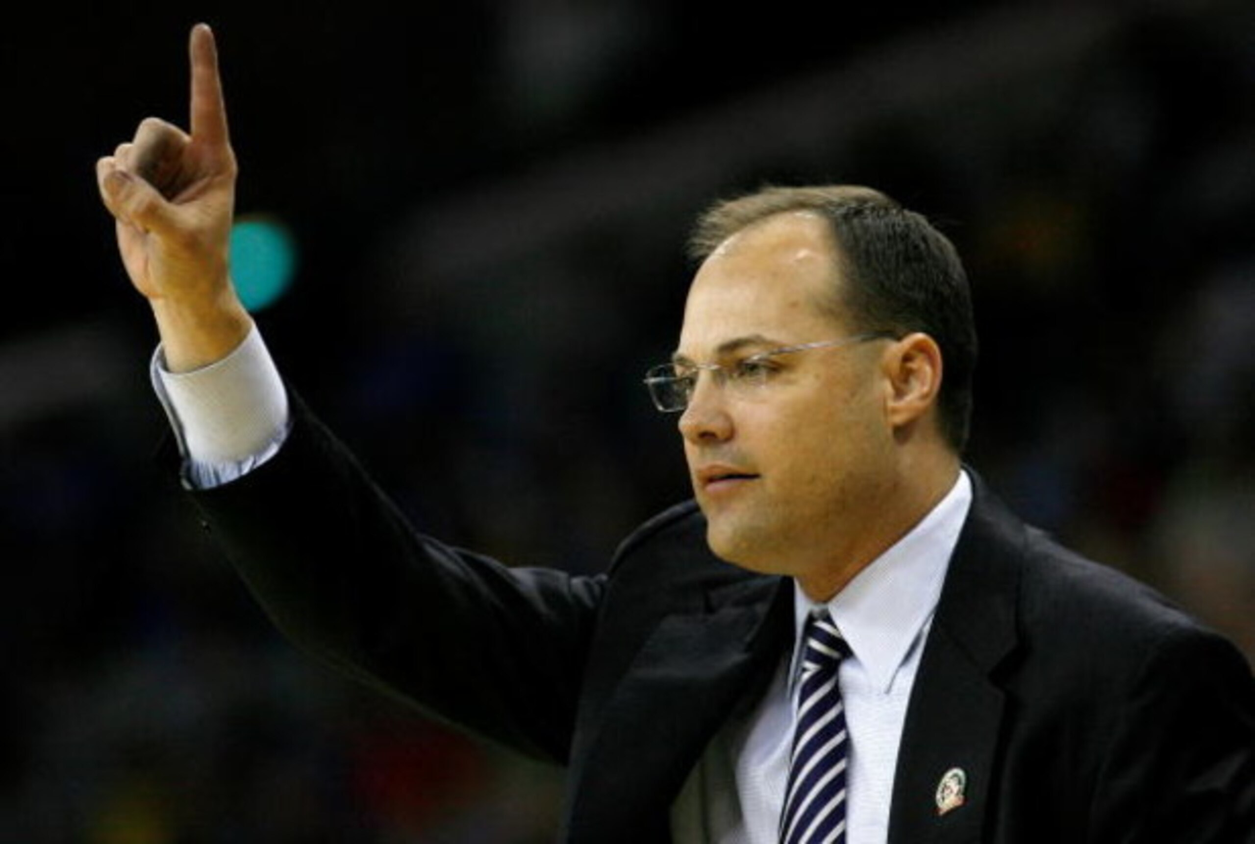 NEW ORLEANS - MARCH 18: Head coach Mark Fox of the Nevada Wolf Pack signals from the sidelines during the second half against the Memphis Tigers during in two of the NCAA Men's Basketball Tournament at the New Orleans Arena on March 18, 2007 in New Orlea NEW ORLEANS - MARCH 18: Head coach Mark Fox of the Nevada Wolf Pack signals from the sidelines during the second half against the Memphis Tigers during in two of the NCAA Men's Basketball Tournament at the New Orleans Arena on March 18, 2007 in New Orlea
