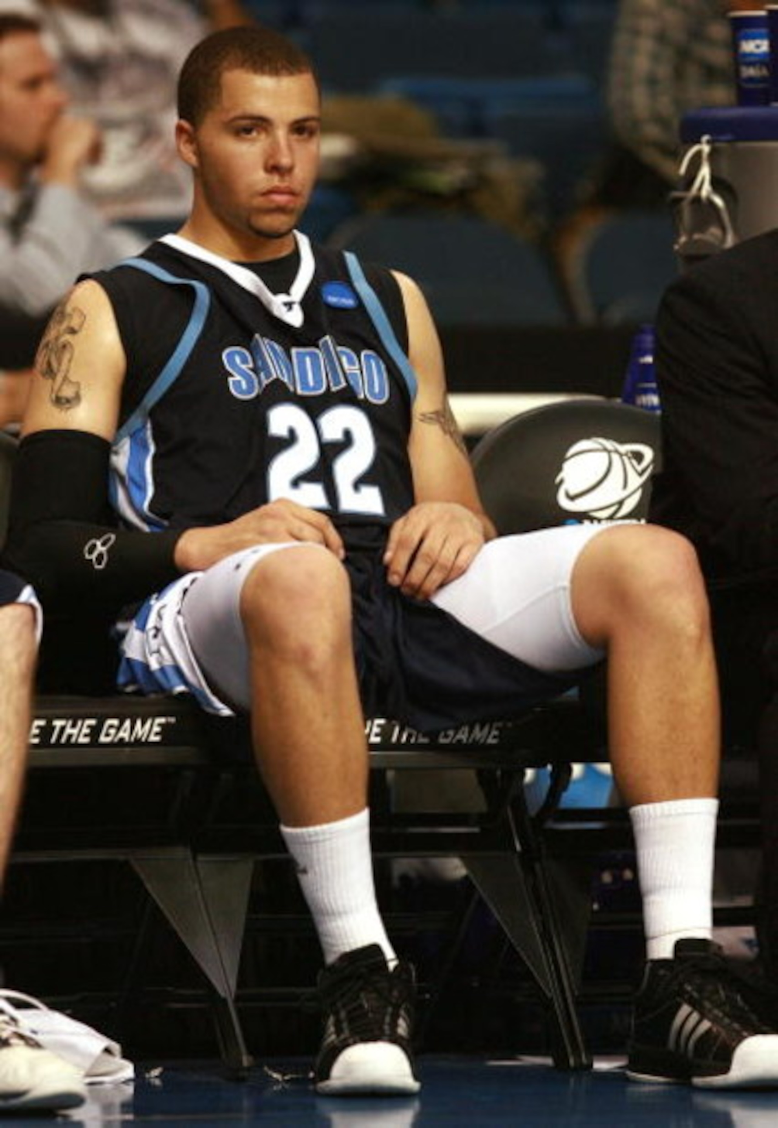 TAMPA, FL - MARCH 23: Rob Jones #22 of the San Diego Toreros sits on the bench late in the game against the Western Kentucky Hilltoppers in the second round of the 2008 NCAA Tournament West Regional at the St. Pete Times Forum March 23, 2008 in Tampa, Fl TAMPA, FL - MARCH 23: Rob Jones #22 of the San Diego Toreros sits on the bench late in the game against the Western Kentucky Hilltoppers in the second round of the 2008 NCAA Tournament West Regional at the St. Pete Times Forum March 23, 2008 in Tampa, Fl
