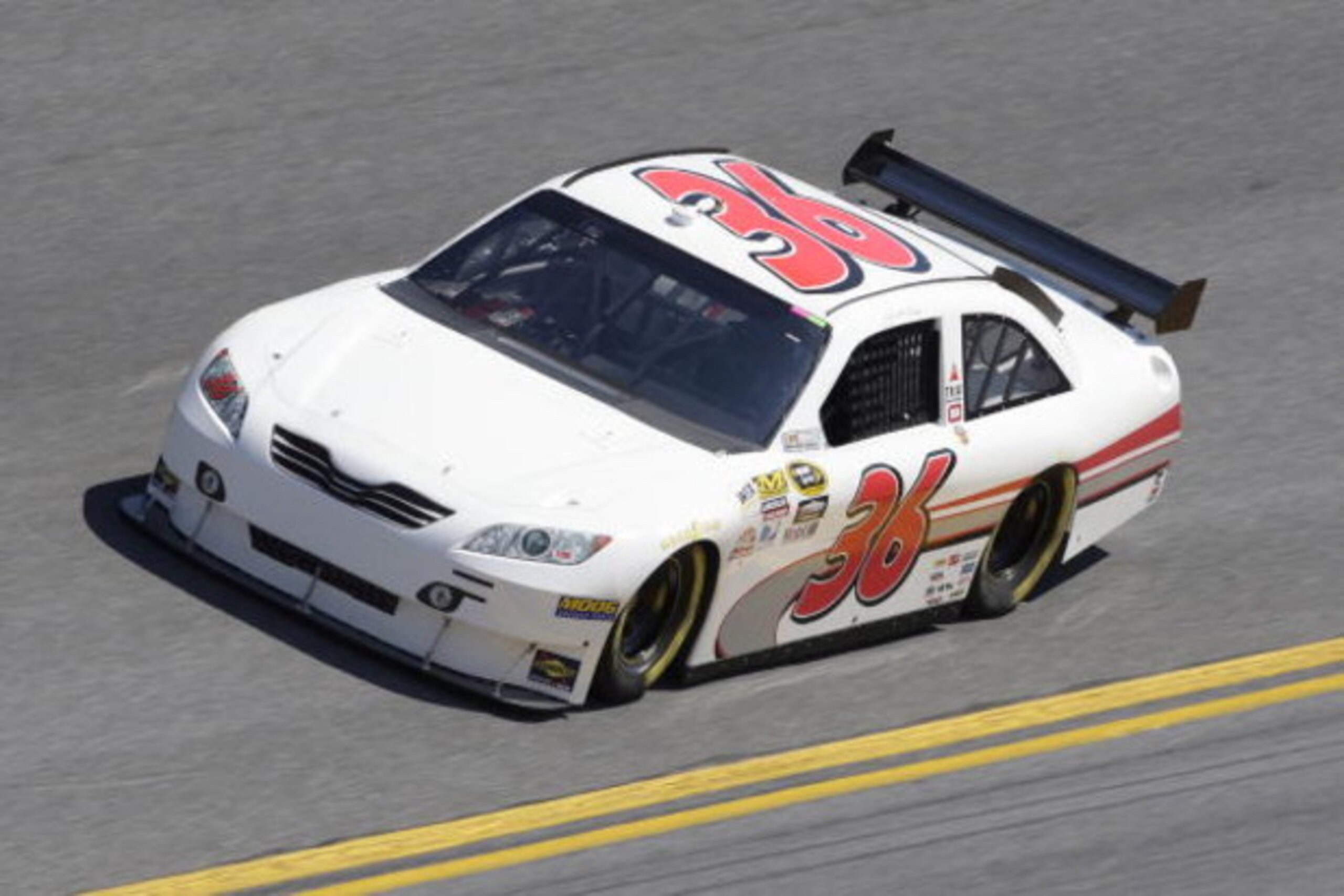 DAYTONA BEACH, FL - FEBRUARY 07:  Scott Riggs driver of the #36 Toyota, Drives during practice for the NASCAR Sprint Cup Series Daytona 500 at Daytona International Speedway on February 7, 2009 in Daytona Beach, Florida.  (Photo by John Harrelson/Getty Im
