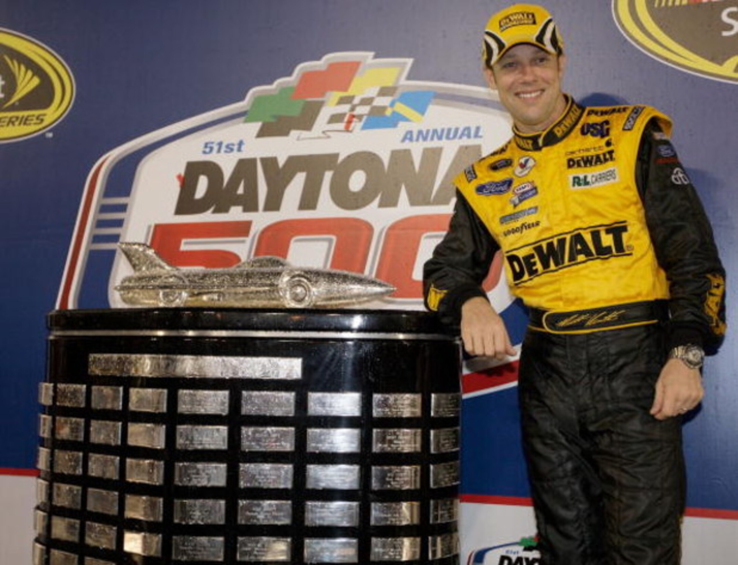 DAYTONA BEACH, FL - FEBRUARY 15:  Matt Kenseth, driver of the #17 DEWALT Ford, celebrates in victory lane after winning the NASCAR Sprint Cup Series Daytona 500 at Daytona International Speedway on February 15, 2009 in Daytona Beach, Florida.  (Photo by J