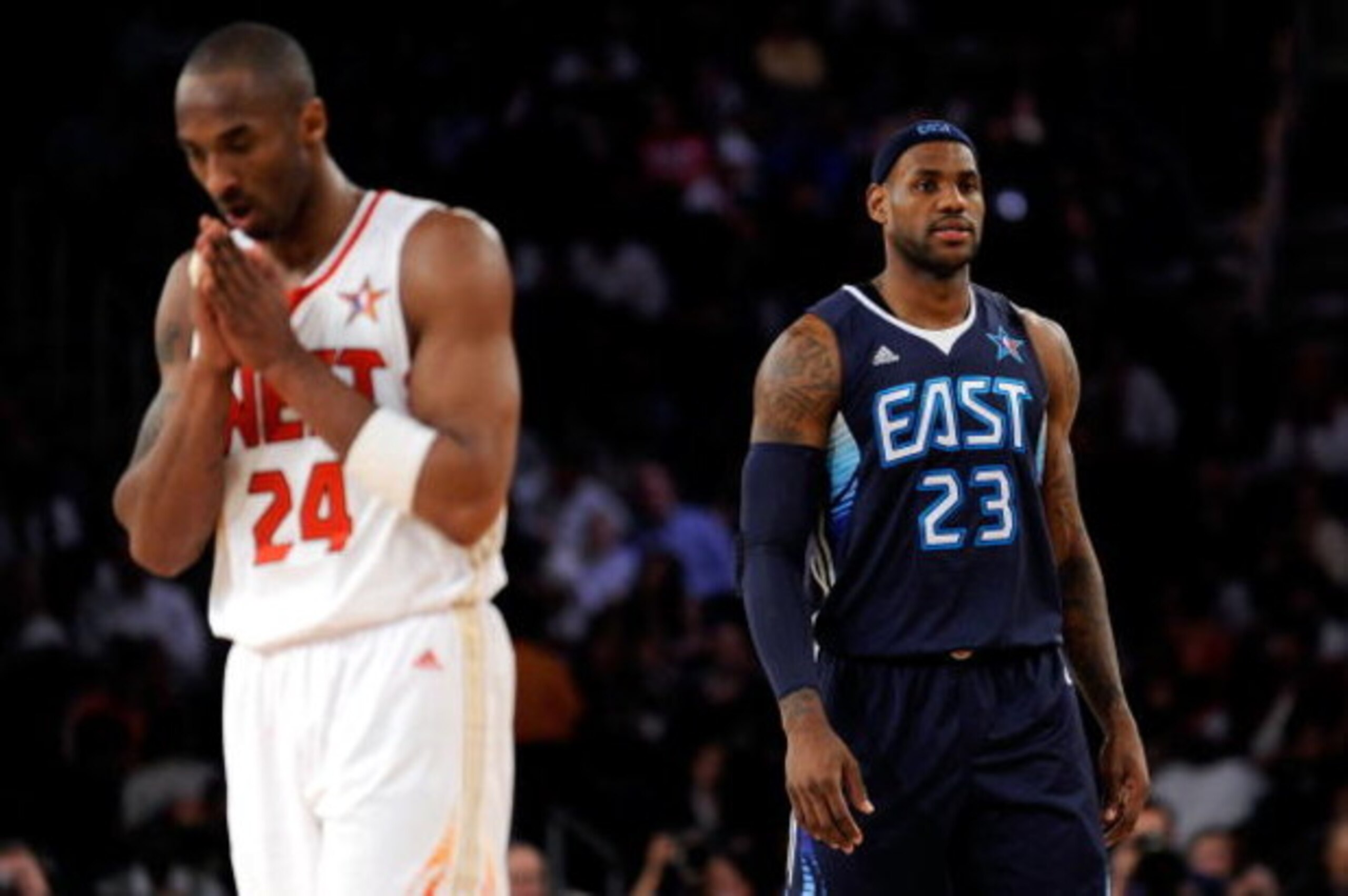 PHOENIX - FEBRUARY 15:  Kobe Bryant #24 of the Western Conference walks across the court in front of LeBron James #23 of the Eastern Conference during the 58th NBA All-Star Game, part of 2009 NBA All-Star Weekend at US Airways Center on February 15, 2009 
