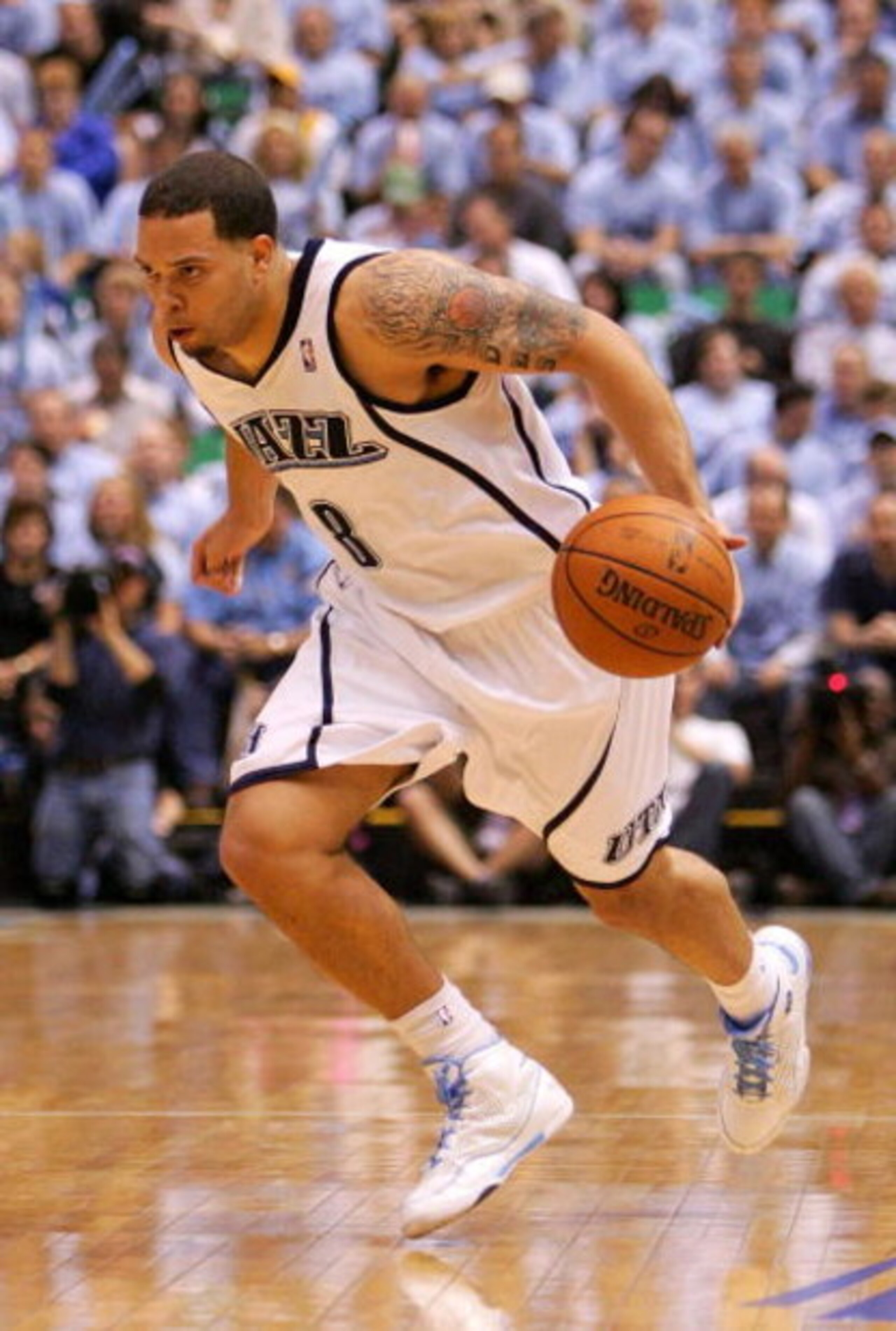 SALT LAKE CITY - MAY 09:  Deron Williams #8 of the Utah Jazz drives against the Los Angeles Lakers in Game Three of the Western Conference Semifinals during the 2008 NBA Playoffs on May 9, 2008 at Energy Solutions Arena in Salt Lake City. NOTE TO USER: Us