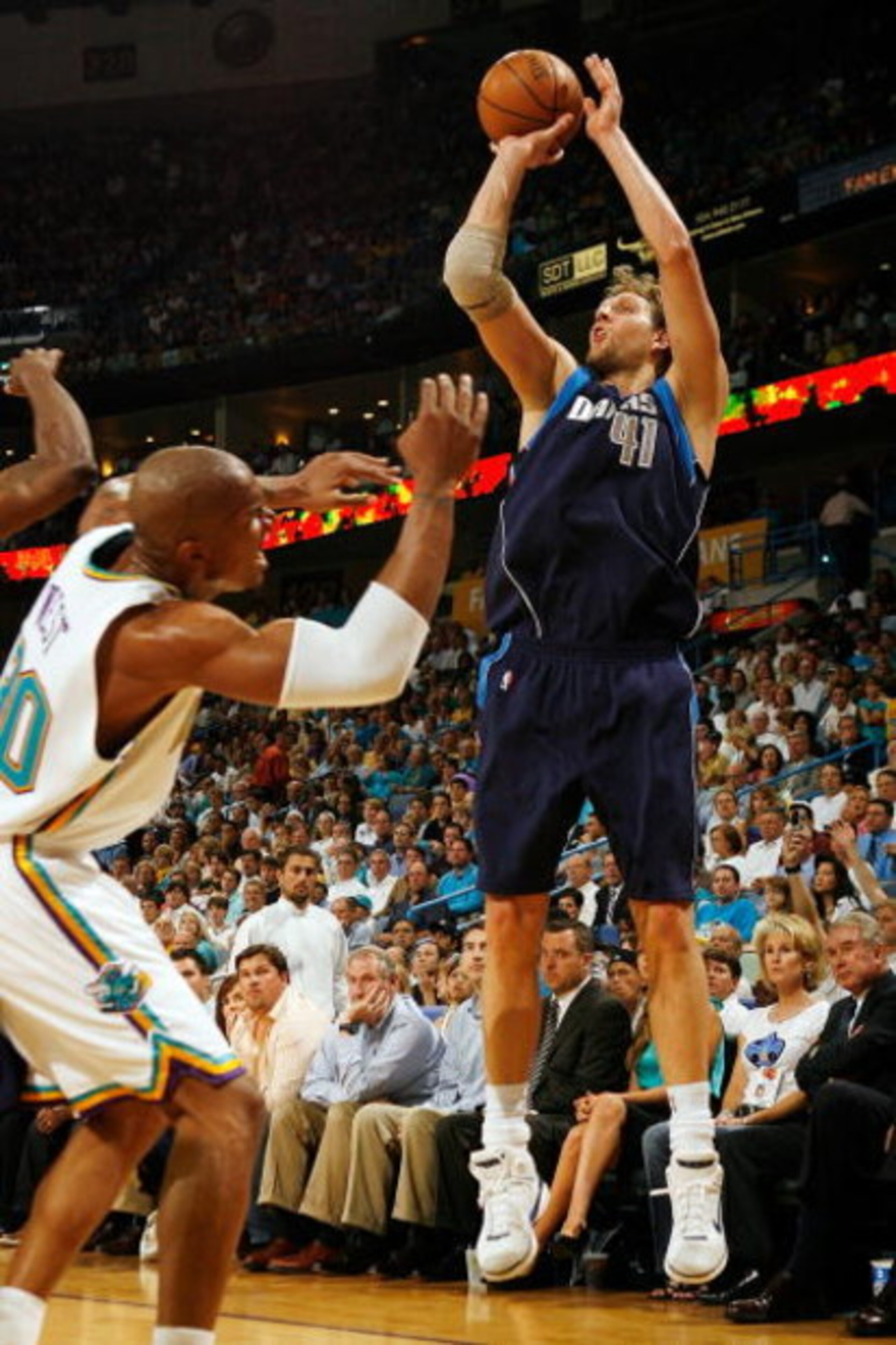 NEW ORLEANS - APRIL 29:  Dirk Nowitzki #41 of the Dallas Mavericks makes a shot over David West #30 of the New Orleans Hornets in Game Five of the Western Conference Quarterfinals during the 2008 NBA Playoffs at The New Orleans Arena April 29, 2008 in New