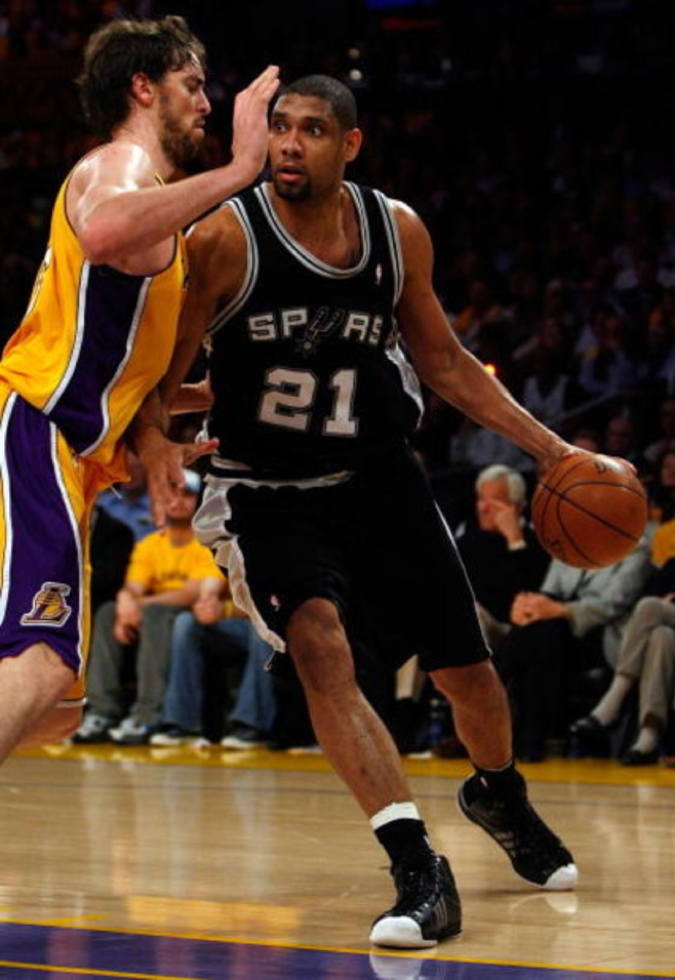 LOS ANGELES, CA - MAY 29:  Tim Duncan #21 of the San Antonio Spurs drives on Pau Gasol #16 of the Los Angeles Lakers in Game Five of the Western Conference Finals during the 2008 NBA Playoffs on May 29, 2008 at Staples Center in Los Angeles, California.  