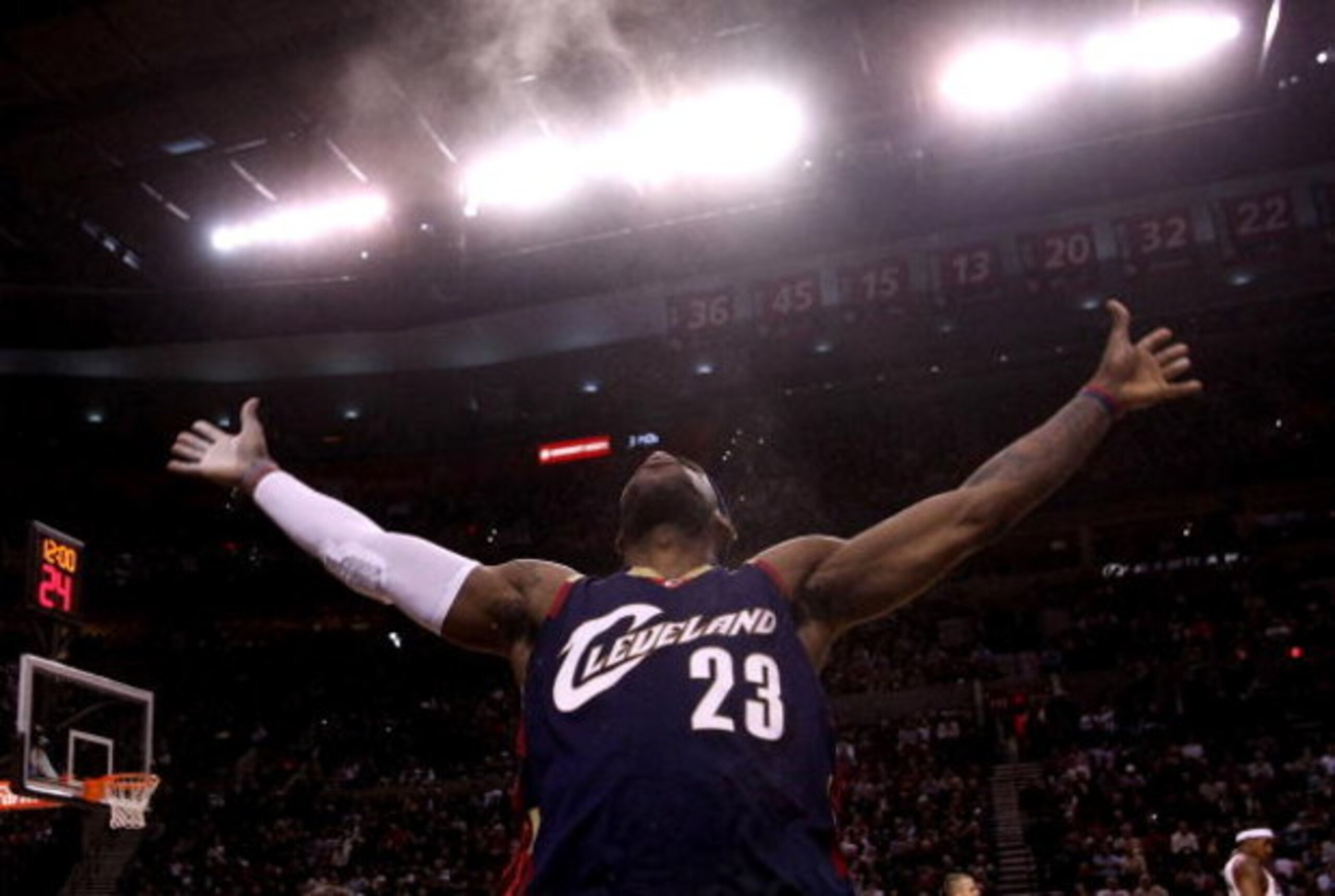 PORTLAND, OR - JANUARY 21:  LeBron James #23 of the Cleveland Cavaliers throws talcum powder in the air before the start of the game against the Portland Trail Blazers at the Rose Garden on January 21, 2009 in Portland, Oregon.  NOTE TO USER: User express