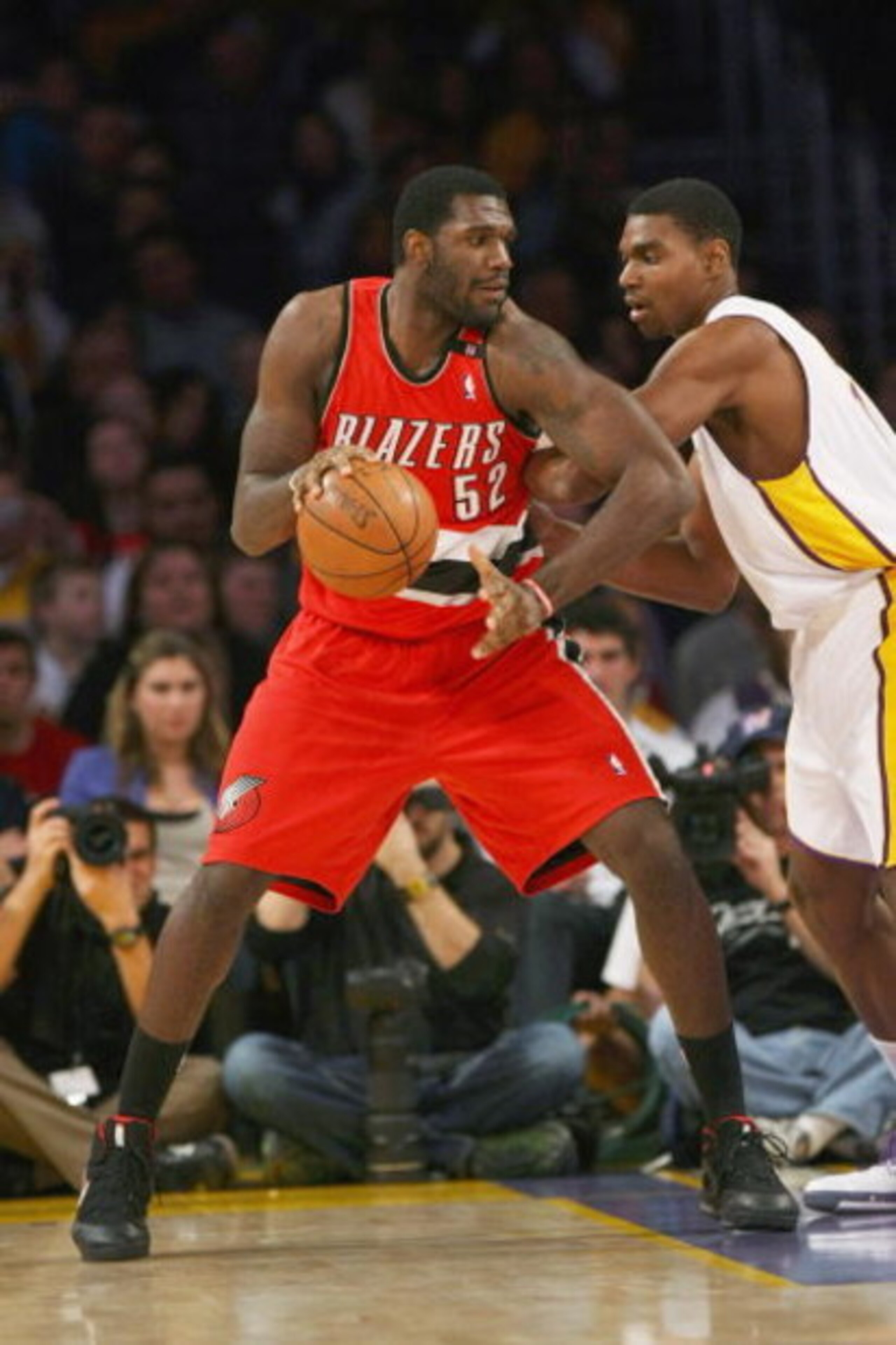 LOS ANGELES - JANUARY 4:  Greg Oden #52 of the Portland Trail Blazers drives against Andrew Bynum #17 of the Los Angeles Lakers on January 4, 2009 at Staples Center in Los Angeles, California.    NOTE TO USER: User expressly acknowledges and agrees that, 