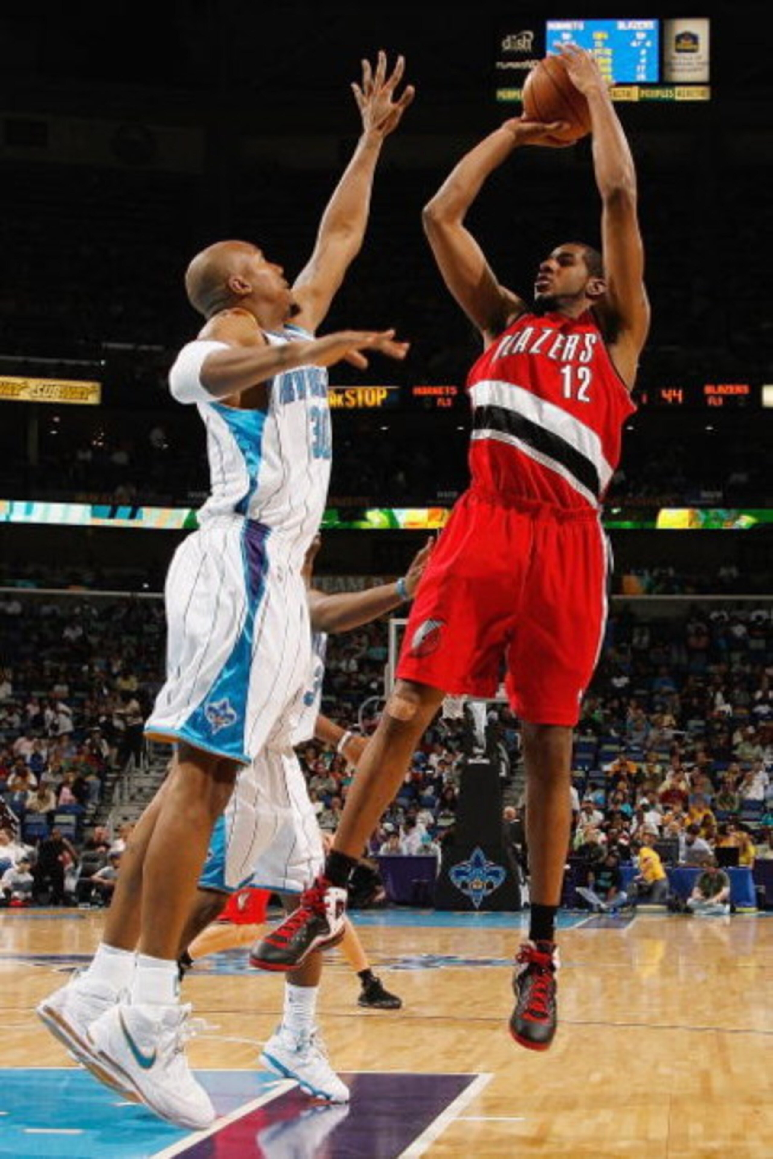 NEW ORLEANS - NOVEMBER 14:  LaMarcus Aldridge #12 of the  Portland Trail Blazers takes a jump shot against David West #30 of the New Orleans Hornets during the game at the New Orleans Arena on November 14, 2008 in New Orleans, Louisiana.  The Hornets defe