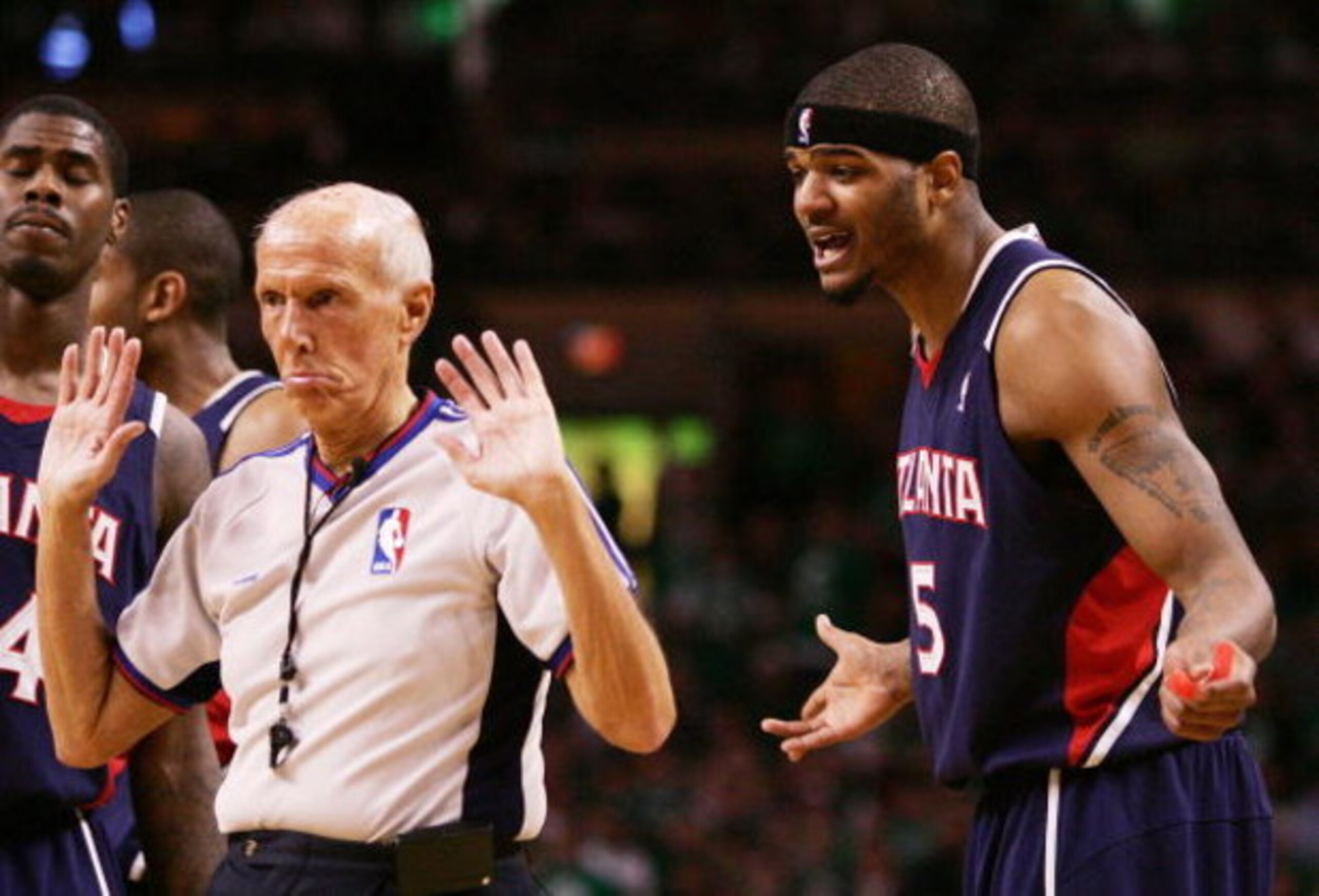 BOSTON - APRIL 30:  Referee Dick Bavetta #27 will not listen as Josh Smith #5 of the Atlanta Hawks tries to plead his case during Game Five of the Eastern Conference Quarterfinals during the 2008 NBA Playoffs on April 30, 2008 at the TD Banknorth Garden i