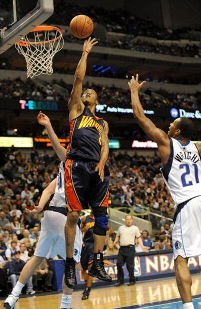 DALLAS - JANUARY 28: Guard Monta Ellis #8 of the Golden State Warriors takes a shot against the Dallas Mavericks on January 28, 2009 at American Airlines Center in Dallas, Texas. NOTE TO USER: User expressly acknowledges and agrees that, by downloading an