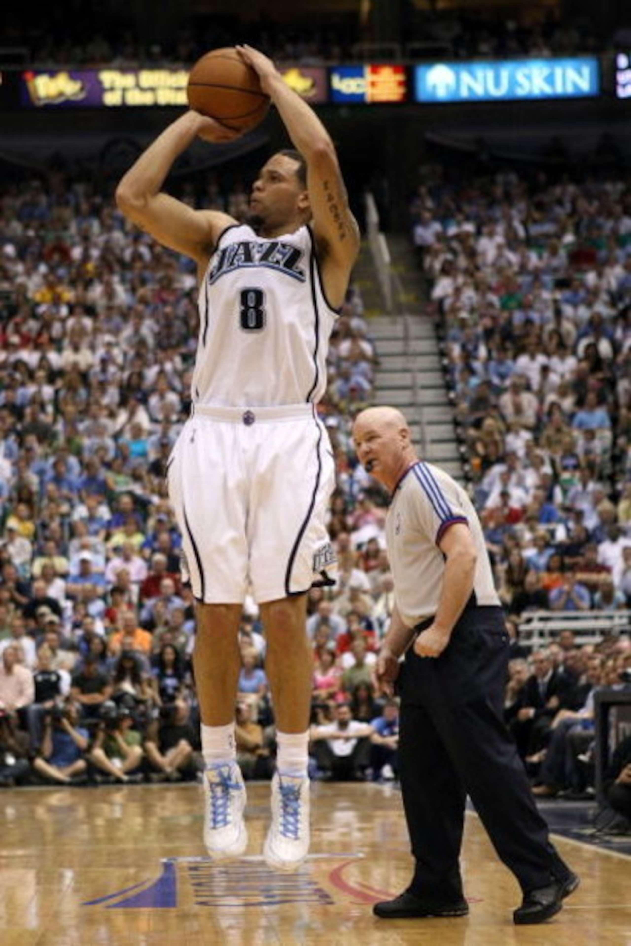 SALT LAKE CITY - MAY 16:  Deron Williams #8 of the Utah Jazz shoots a jumper while taking on the Los Angeles Lakers in Game Six of the Western Conference Semifinals during the 2008 NBA Playoffs at EnergySolutions Arena on May 16, 2008 in Salt Lake City, U