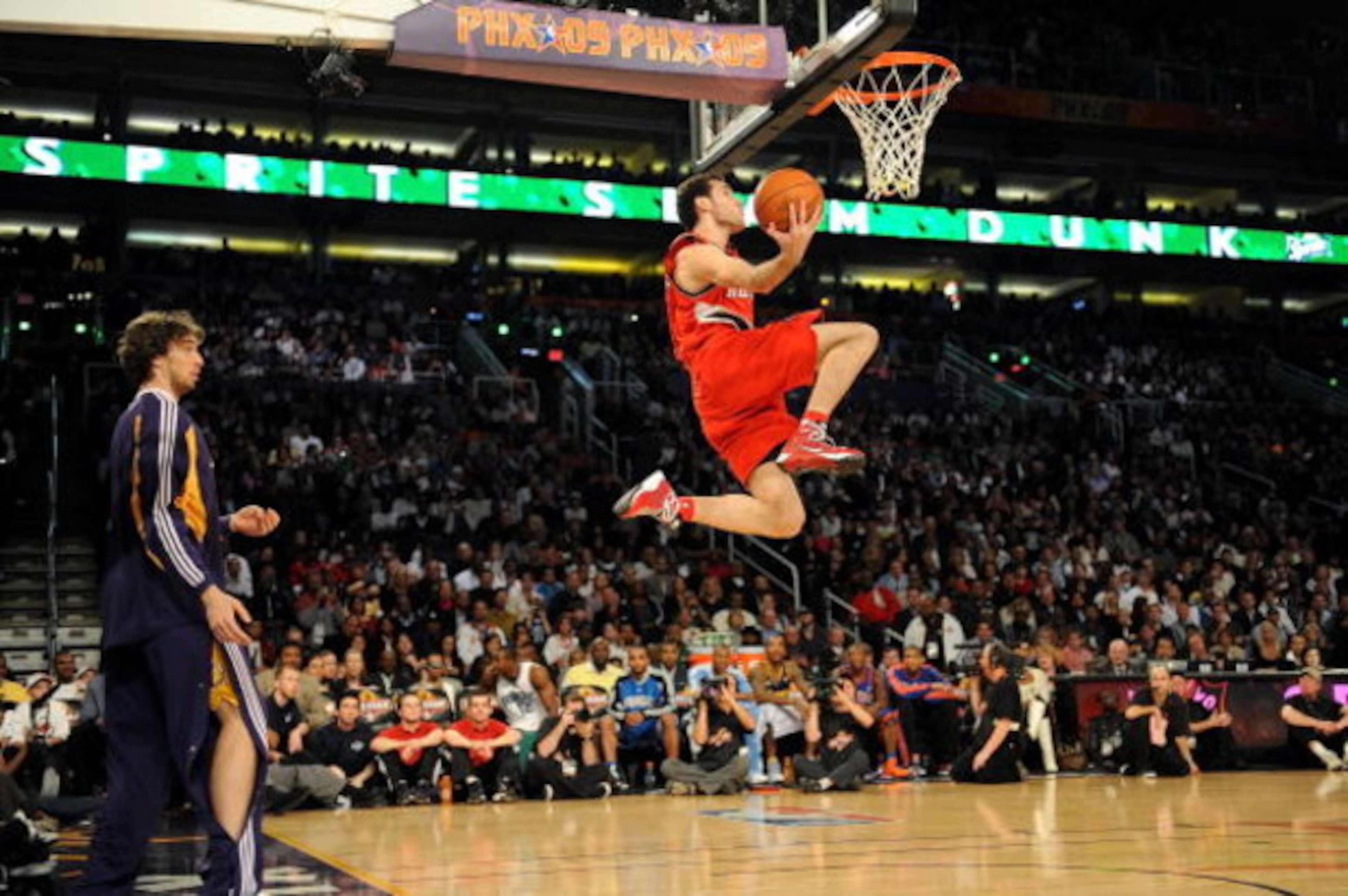 PHOENIX - FEBRUARY 14:  Pau Gasol of the Los Angeles Lakers throws a pass to Rudy Fernandez of the Portland Trail Blazers during the Sprite Slam Dunk Contest on All-Star Saturday Night, part of 2009 NBA All-Star Weekend at US Airways Center on February 14