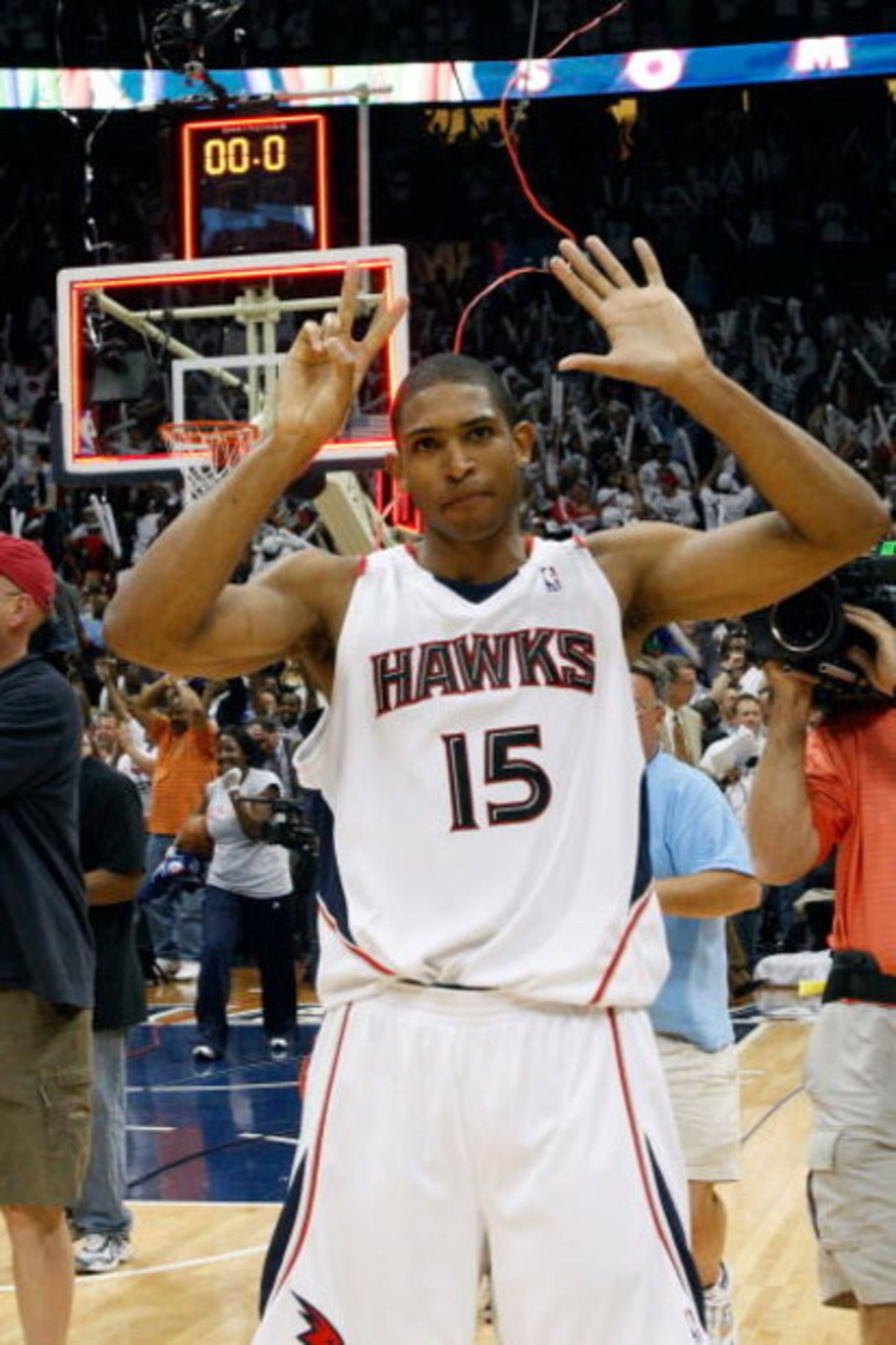 ATLANTA - MAY 02: Al Horford #15 of the Atlanta Hawks celebrates after defeating the Boston Celtics 103-100 in Game Six of the Eastern Conference Quarterfinals during the 2008 NBA Playoffs at Phillips Arena on May 2, 2008 in Atlanta Georgia.  NOTE TO USER