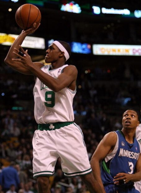 BOSTON - FEBRUARY 01:  Rajon Rondo #9 of the Boston Celtics makes the shot past Sebastian Telfair #3 of Minnesota Timberwolves on February 1, 2009 at TD Banknorth Garden in Boston, Massachusetts. The Celtics defeated the Minnesota Timberwolves 109-101. NO