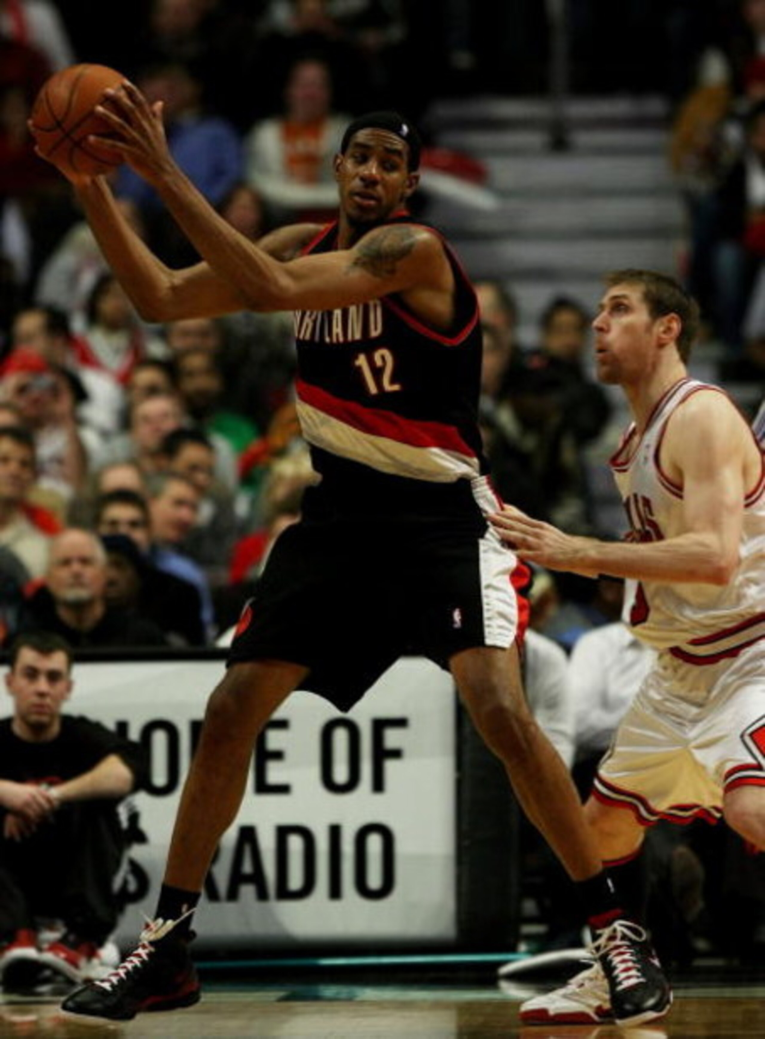 CHICAGO - JANUARY 12: LaMarcus Aldridge #12 of the Portland Trail Blazers moves against Andres Nocioni #5 of the Chicago Bulls on January 12, 2009 at the United Center in Chicago, Illinois. The Trail Blazers defeated the Bulls 109-95. NOTE TO USER: User e