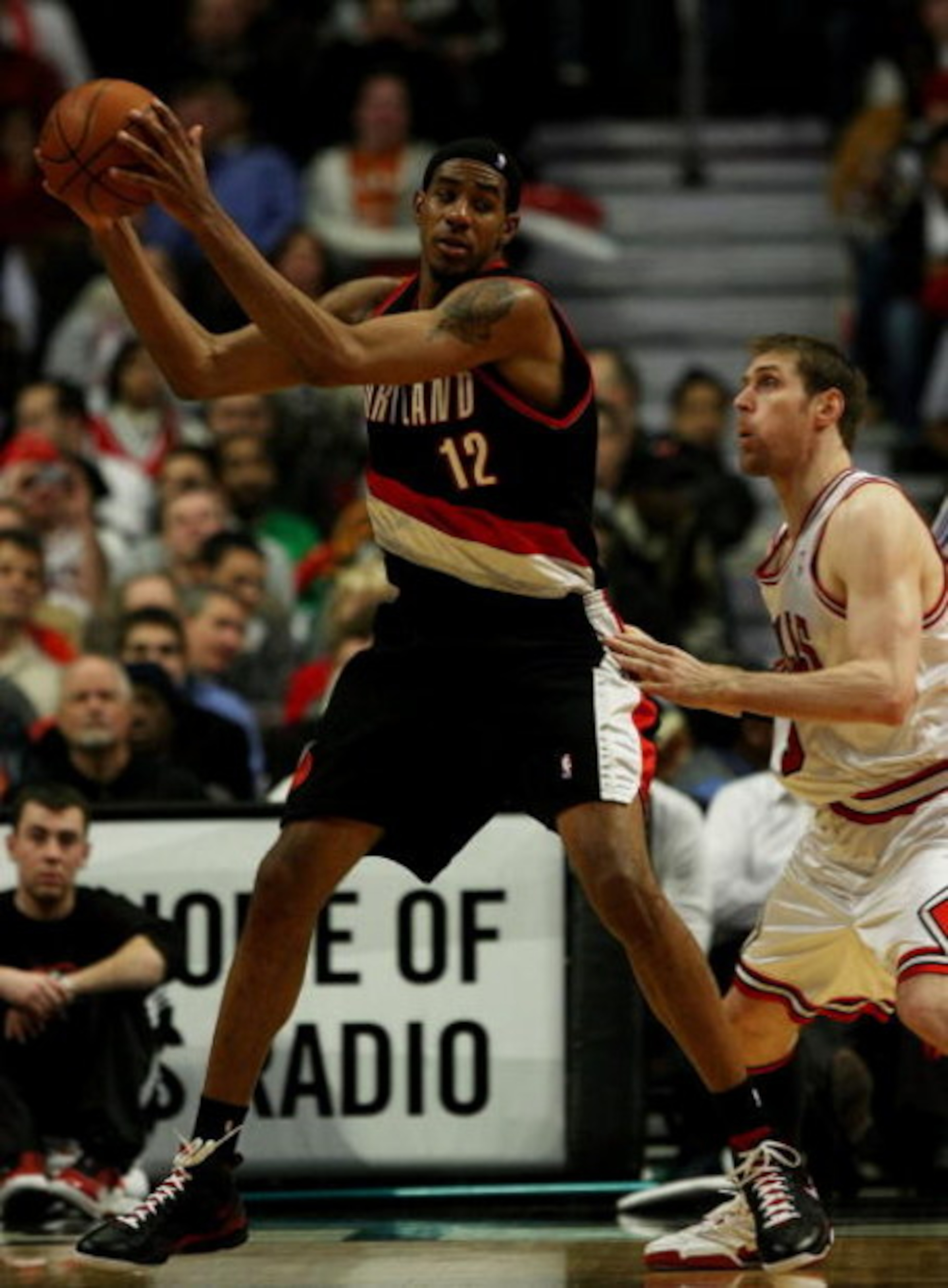 CHICAGO - JANUARY 12: LaMarcus Aldridge #12 of the Portland Trail Blazers moves against Andres Nocioni #5 of the Chicago Bulls on January 12, 2009 at the United Center in Chicago, Illinois. The Trail Blazers defeated the Bulls 109-95. NOTE TO USER: User e