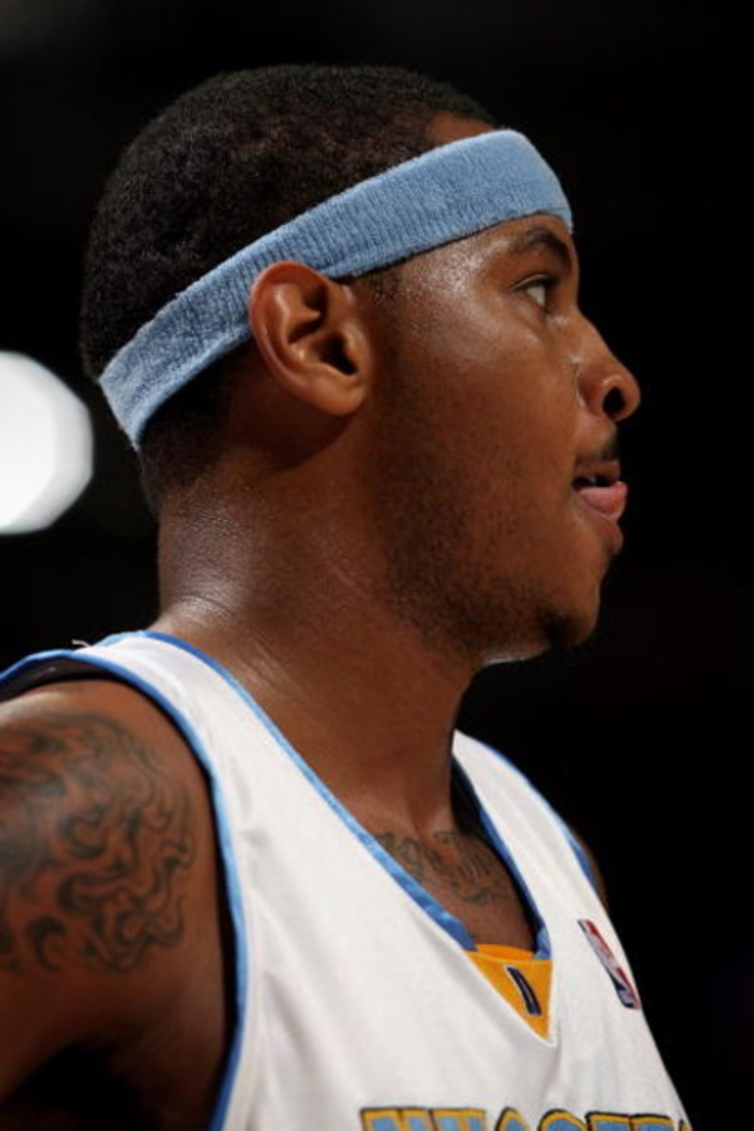 DENVER - NOVEMBER 18:  Carmelo Anthony #15 of the Denver Nuggets awaits action against the Milwaukee Bucks at the Pepsi Center on November 18, 2008 in Denver, Colorado. The Nuggets defeated the Bucks 114-105.  (Photo by Doug Pensinger/Getty Images)