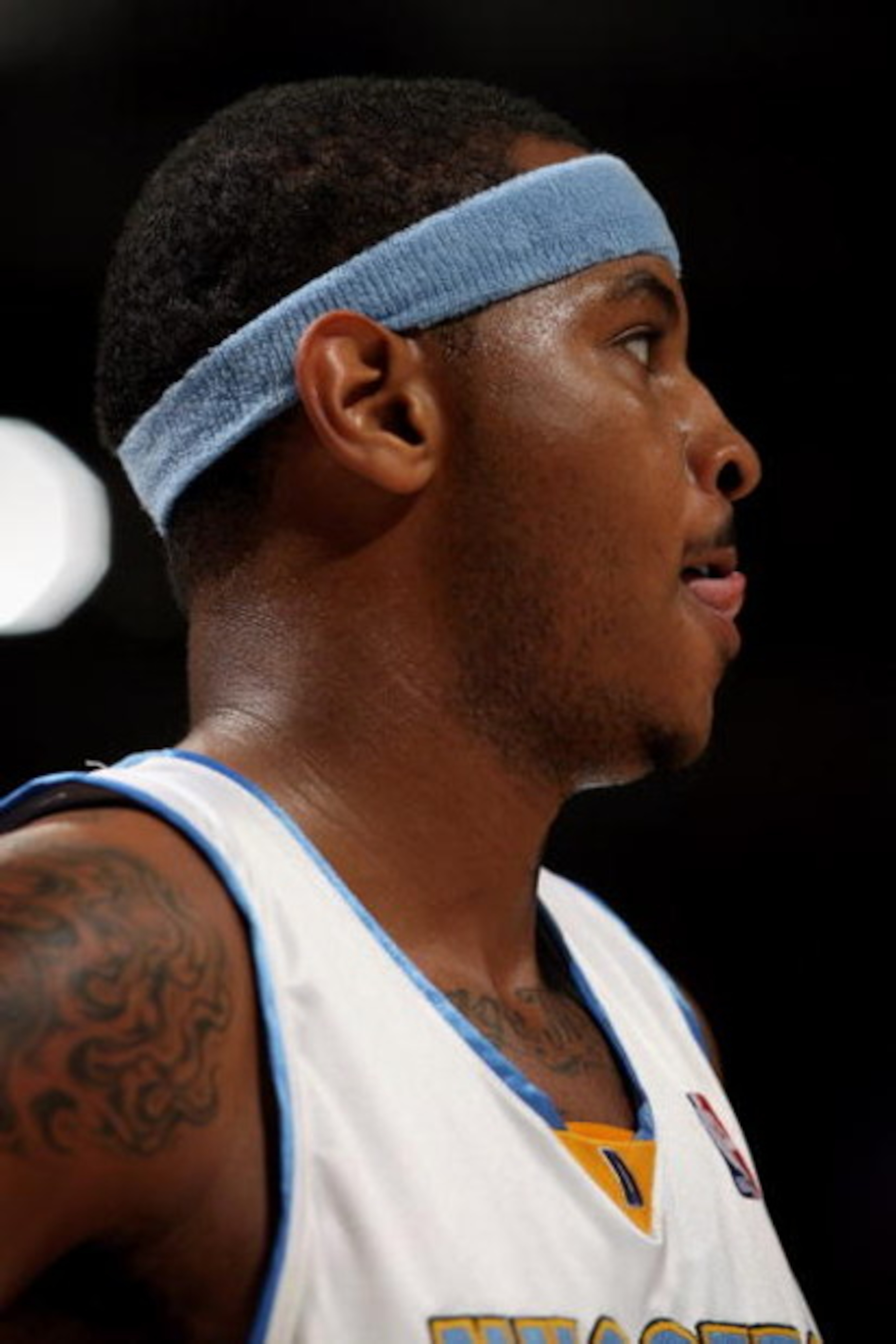 DENVER - NOVEMBER 18:  Carmelo Anthony #15 of the Denver Nuggets awaits action against the Milwaukee Bucks at the Pepsi Center on November 18, 2008 in Denver, Colorado. The Nuggets defeated the Bucks 114-105.  (Photo by Doug Pensinger/Getty Images)