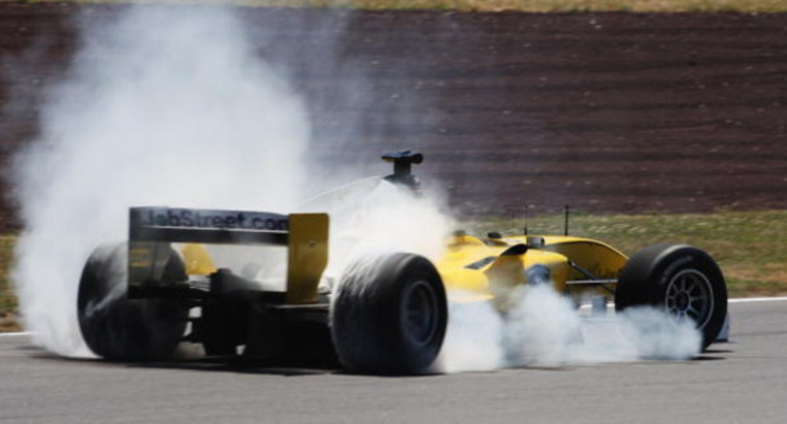 TAUPO, NEW ZEALAND - JANUARY 23:  Fairuz Fauzy of Malaysia smokes his tyres up as he spins his car at the hairpin turn during official practice session two for the New Zealand A1 Grand Prix at the Taupo Race Track January 23, 2009 in Taupo, New Zealand.  