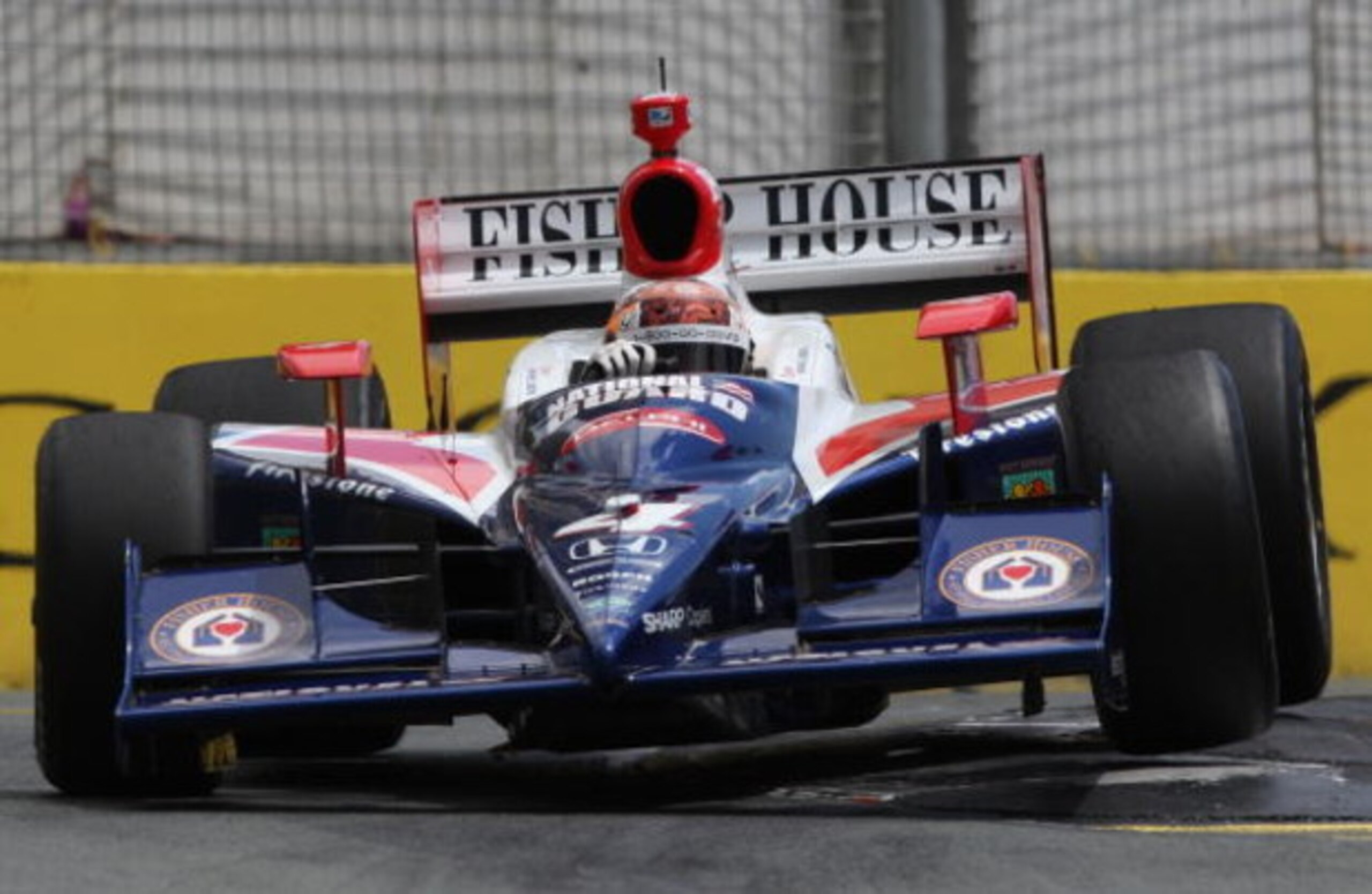 GOLD COAST, AUSTRALIA - OCTOBER 25:  Dan Wheldon driver of the #4 Panther Racing Dallara Honda enters the first chicane during practice for the IRL Indy Car Series  Nikon Indy 300 on October 25, 2008 on the Gold Coast, Australia.  (Photo by Bradley Kanari