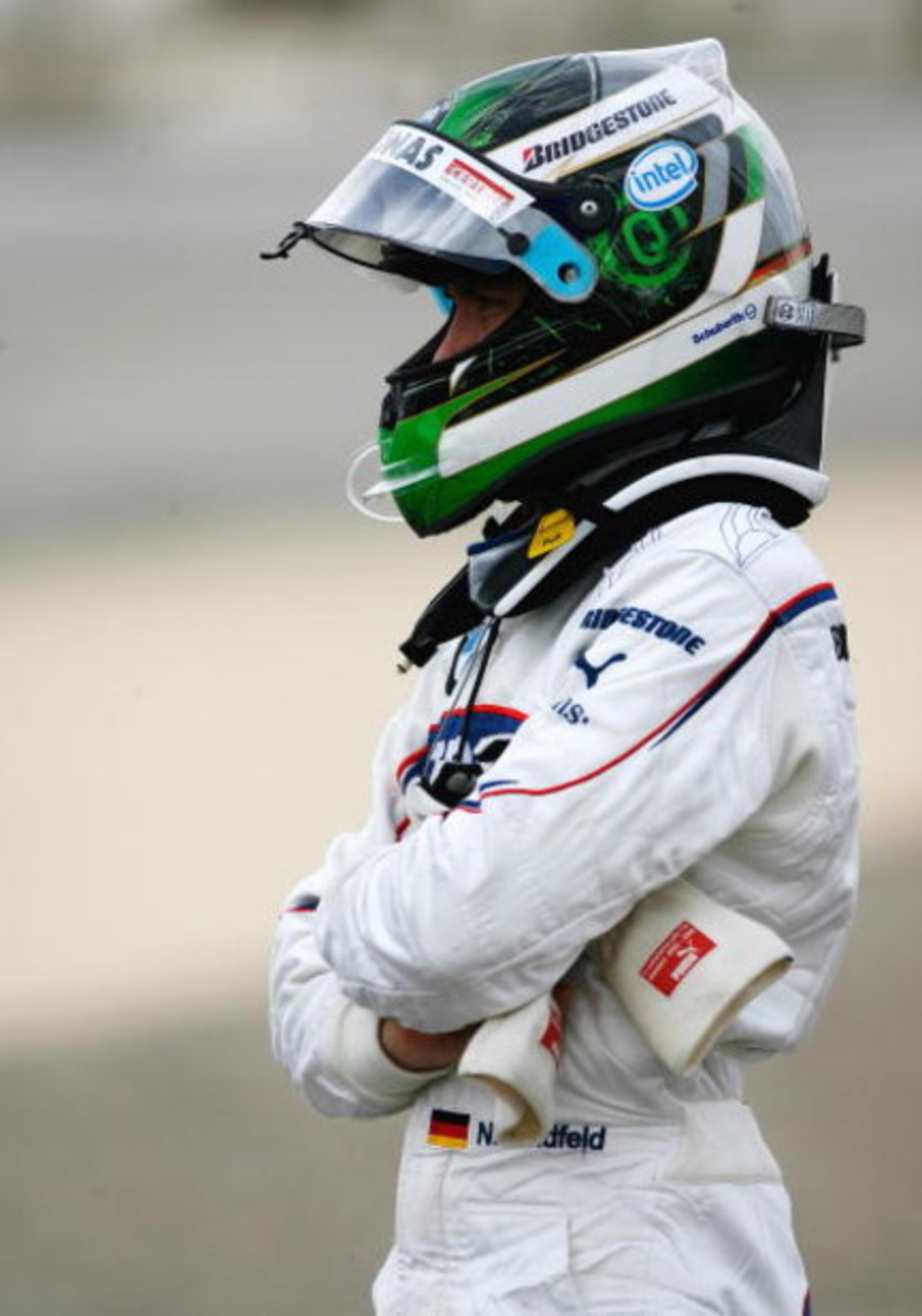 SAKHIR, BAHRAIN - FEBRUARY 18:  Nick Heidfeld of Germany and BMW looks on after his car broke down during Formula One testing ahead of the 2009 Formula One season at the Bahrain International Circuit on February 18, 2009 in Sakhir, Bahrain.  (Photo by Pau