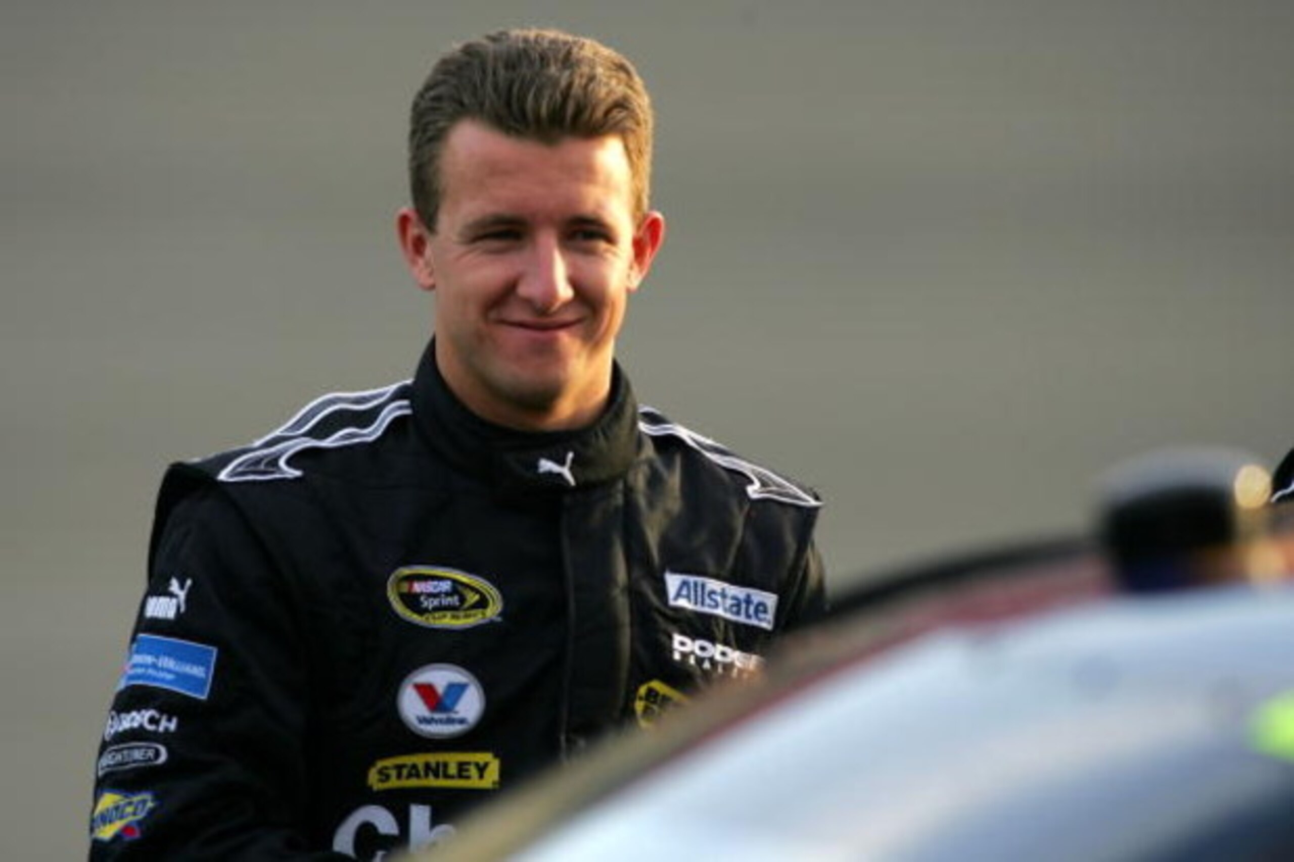 FONTANA, CA - FEBRUARY 20:  AJ Allmendinger, driver of the #44 Charter Communications Dodge, prepares to drive during qualifying for the NASCAR Sprint Cup Series Auto Club 500 at Auto Club Speedway on February 20, 2009 in Fontana, California.  (Photo by T