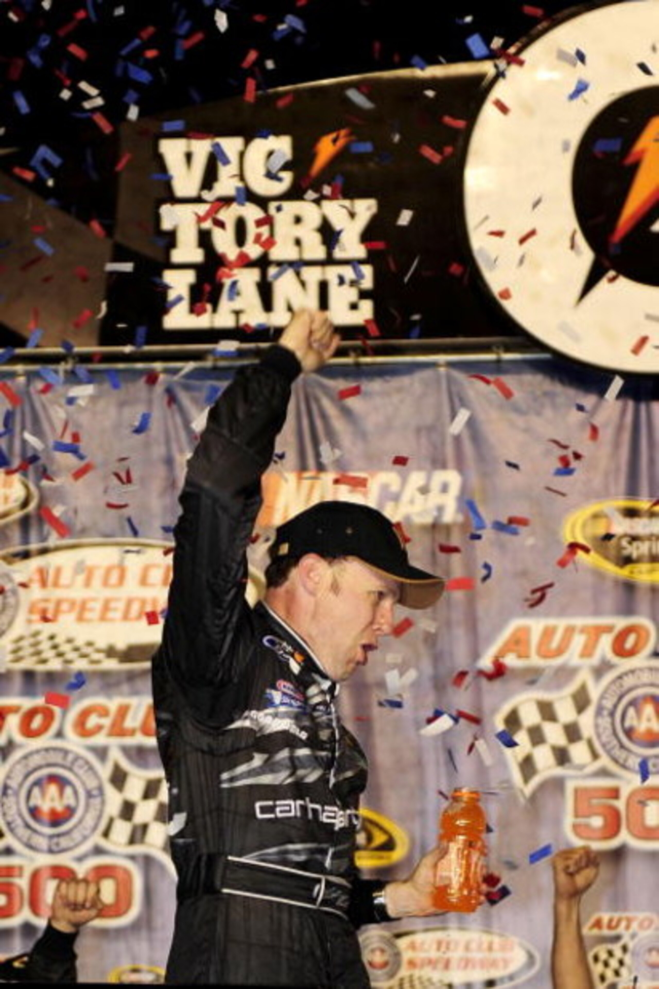 FONTANA, CA - FEBRUARY 22:  Matt Kenseth, driver of the #17 Carhartt Ford, celebrates in victory lane after winning the NASCAR Sprint Cup Series Auto Club 500 at Auto Club Speedway on February 22, 2009 in Fontana, California.  (Photo by Rusty Jarrett/Gett