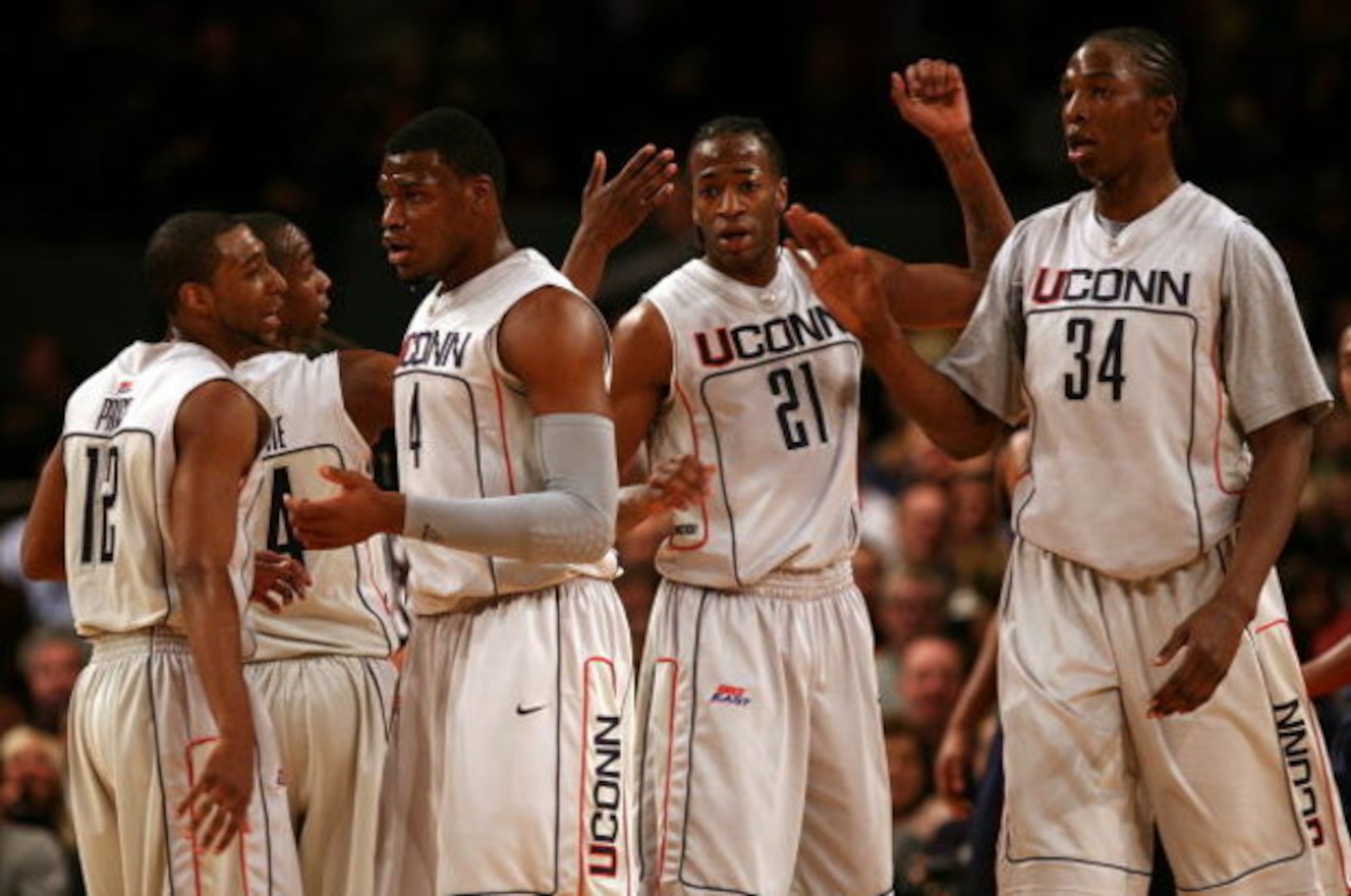 NEW YORK - MARCH 13:  A.J. Price #12, Craig Austrie #24, Jeff Adrien #4, Stanley Robinson #21 and Hasheem Thabeet #34  of the Connecticut Huskies looks on against the West Virginia Mountaineers during day two of the 2008 Big East Men's Basketball Champion