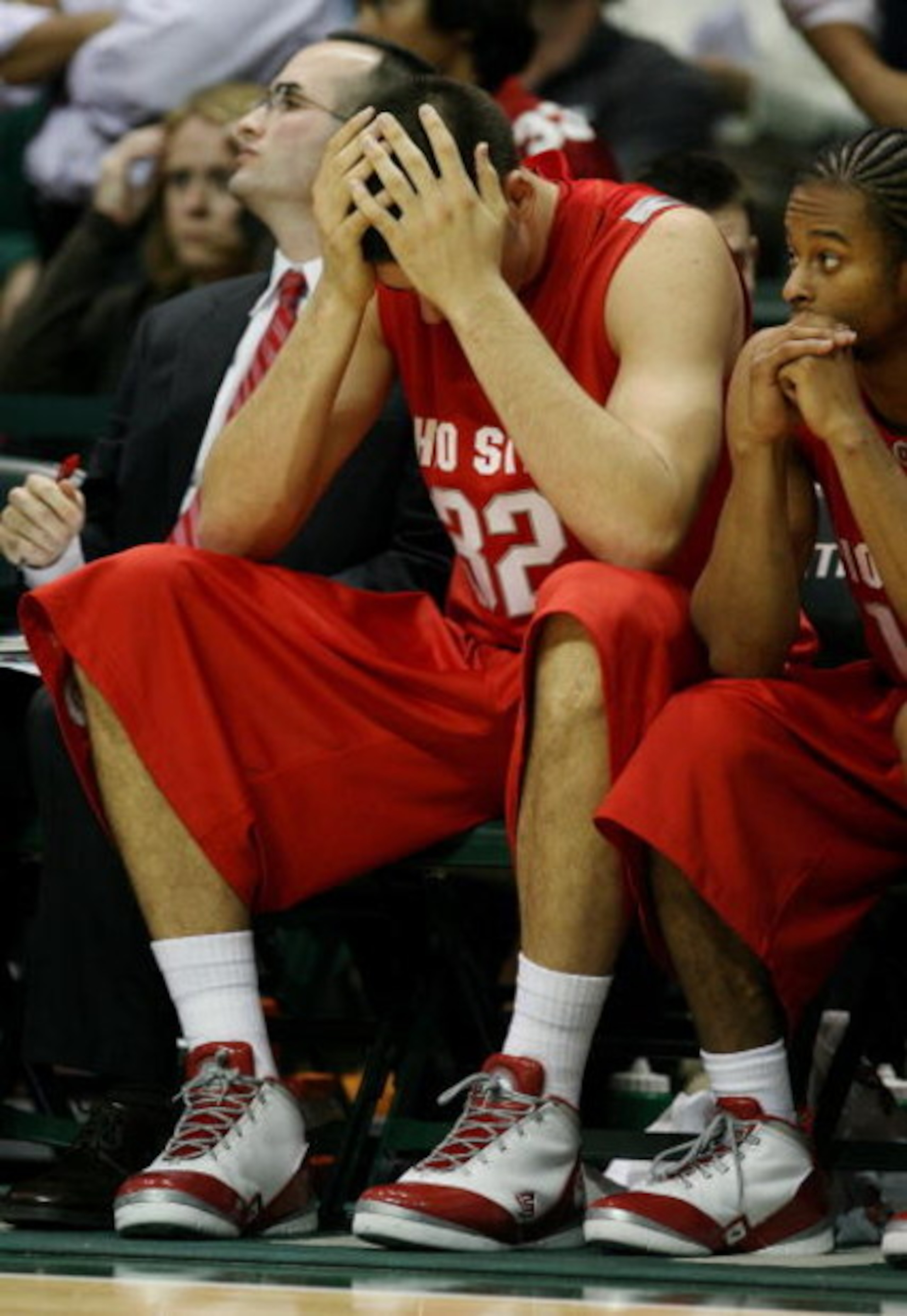 CORAL GABLES, FL - DECEMBER 02:  B.J. Mullens #32 of the Ohio State Buckeyes reacts on the bench late in the game against the Miami Hurricanes at BankUnited Center on December 2, 2008 in Coral Gables, Florida. Ohio State defeated Miami 73-68.  (Photo by D