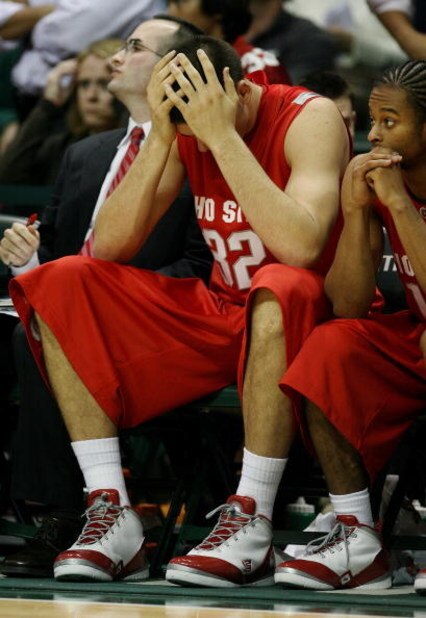 CORAL GABLES, FL - DECEMBER 02:  B.J. Mullens #32 of the Ohio State Buckeyes reacts on the bench late in the game against the Miami Hurricanes at BankUnited Center on December 2, 2008 in Coral Gables, Florida. Ohio State defeated Miami 73-68.  (Photo by D