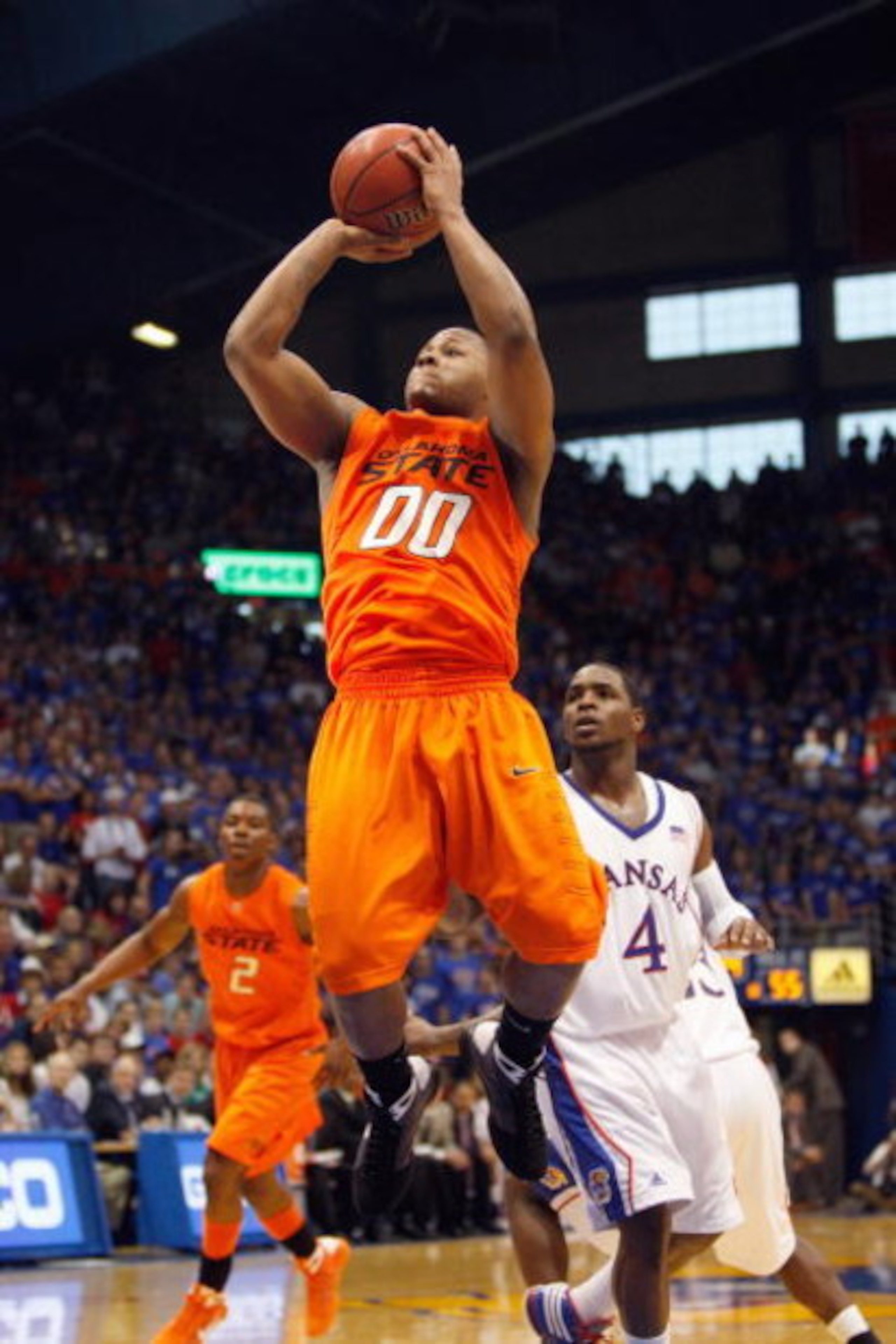LAWRENCE, KANSAS - FEBRUARY 7:  Byron Eaton #00 of the Oklahoma State Cowboys puts a shot up against the Kansas Jayhawks during the game at Allen Fieldhouse on February 7, 2009 in Lawrence, Kansas. (Photo by: Jamie Squire/Getty Images)