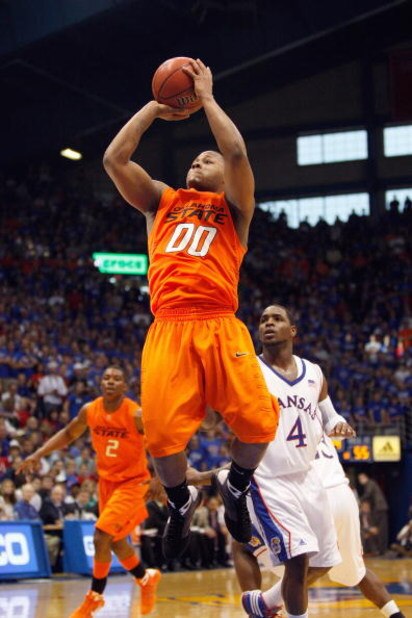 LAWRENCE, KANSAS - FEBRUARY 7:  Byron Eaton #00 of the Oklahoma State Cowboys puts a shot up against the Kansas Jayhawks during the game at Allen Fieldhouse on February 7, 2009 in Lawrence, Kansas. (Photo by: Jamie Squire/Getty Images)