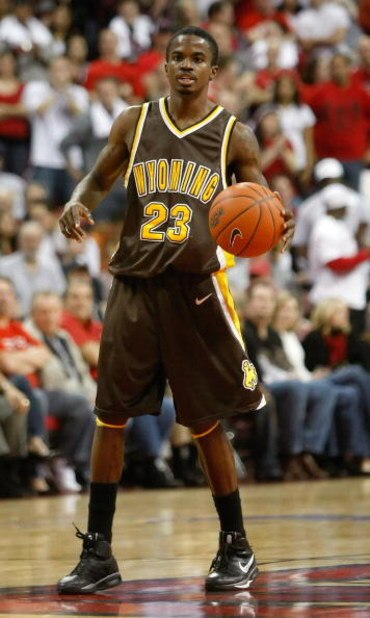 LAS VEGAS - JANUARY 17:  Brandon Ewing #23 of the Wyoming Cowboys brings the ball up the court during a game against the UNLV Rebels at the Thomas & Mack Center January 17, 2009 in Las Vegas, Nevada. UNLV won 83-66.  (Photo by Ethan Miller/Getty Images)