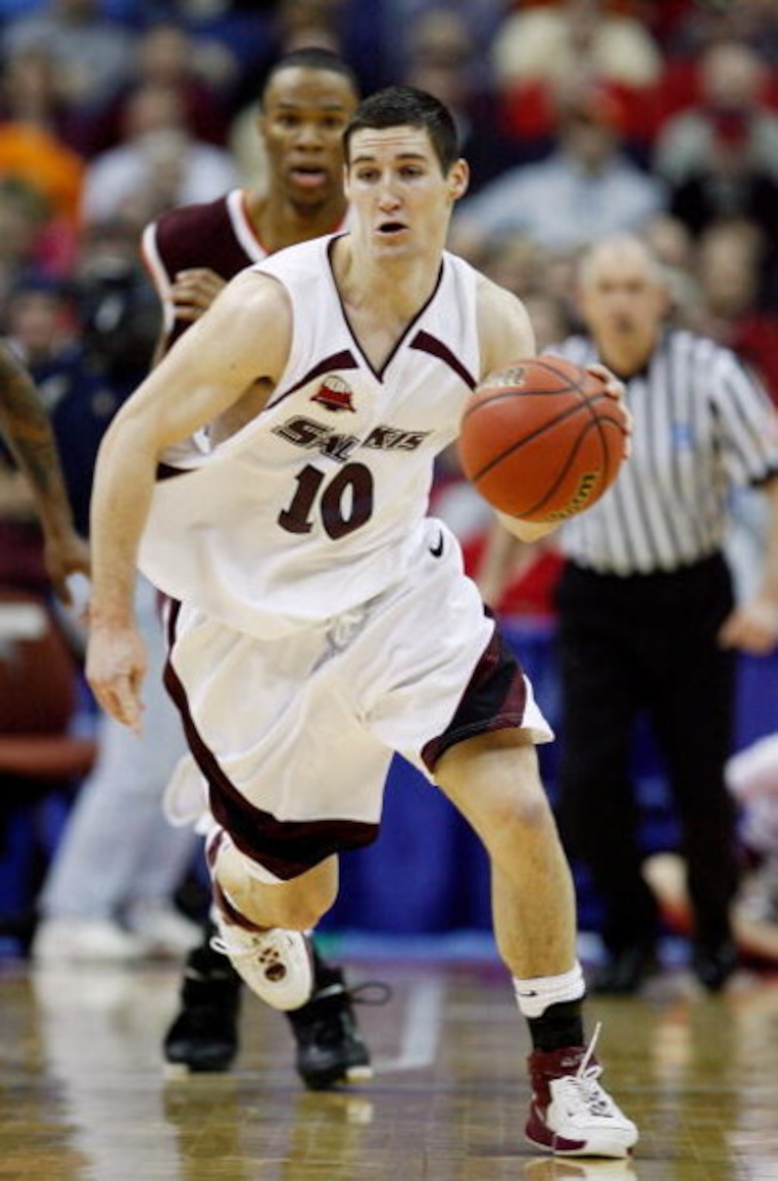 COLUMBUS, OH - MARCH 18:  Bryan Mullins #10 of the Southern Illinois Salukis brings the ball down the court against the Virginia Tech Hokies during the second round of the NCAA Men's Basketball Tournament at Nationwide Arena on March 18, 2007 in Columbus,