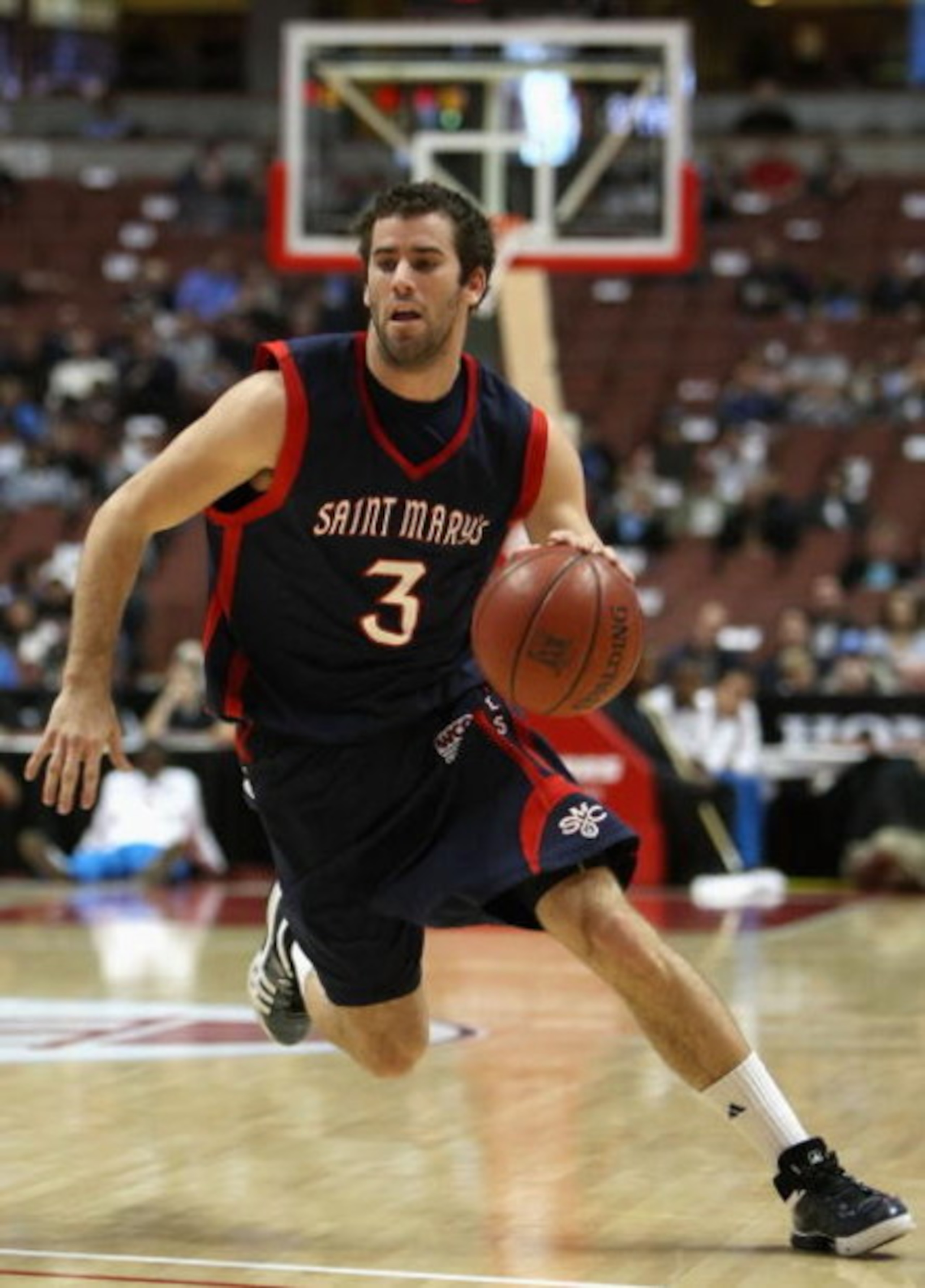 ANAHEIM, CA - DECEMBER 13:  Carlin Hughes #3 of the Saint Mary's Gaels drives with the ball against the San Diego State Aztecs in the John R. Wooden Classic at Honda Center on December 13, 2008 in Anaheim, California. The Gaels defeated the Aztecs 67-64. 