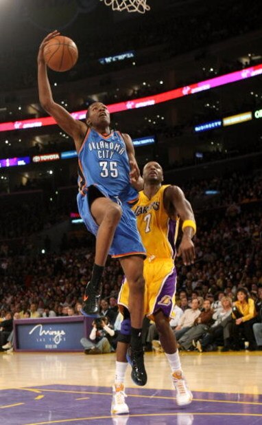 LOS ANGELES - FEBRUARY 10:  Kevin Durant #35 of the Oklahoma City Thundergoes up for a shot over Lamar Odom #7 of the Los Angeles Lakers on February 10, 2009 at Staples Center in Los Angeles, California.  The Lakers won 105-98.   NOTE TO USER: User expres