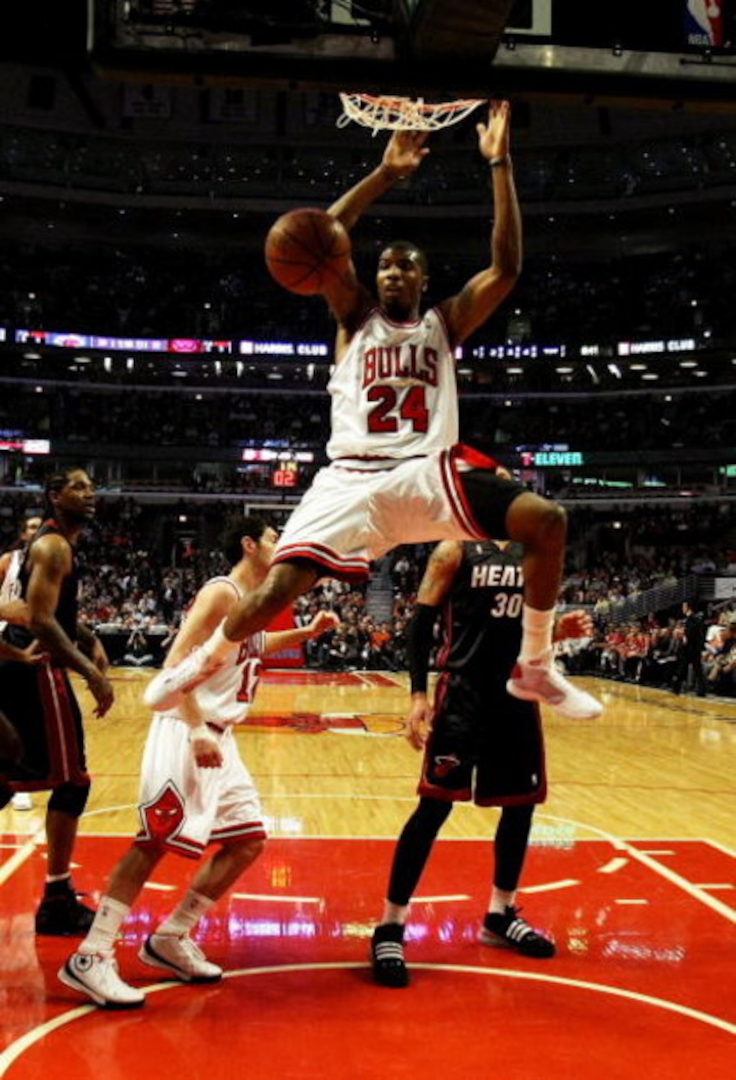 CHICAGO - FEBRUARY 12: Tyrus Thomas #24 of the Chicago Bulls dunks the ball against the Miami Heat on February 12, 2009 at the United Center in Chicago, Illinois. The Heat defeated the Bulls 95-93. NOTE TO USER: User expressly acknowledges and agreees tha