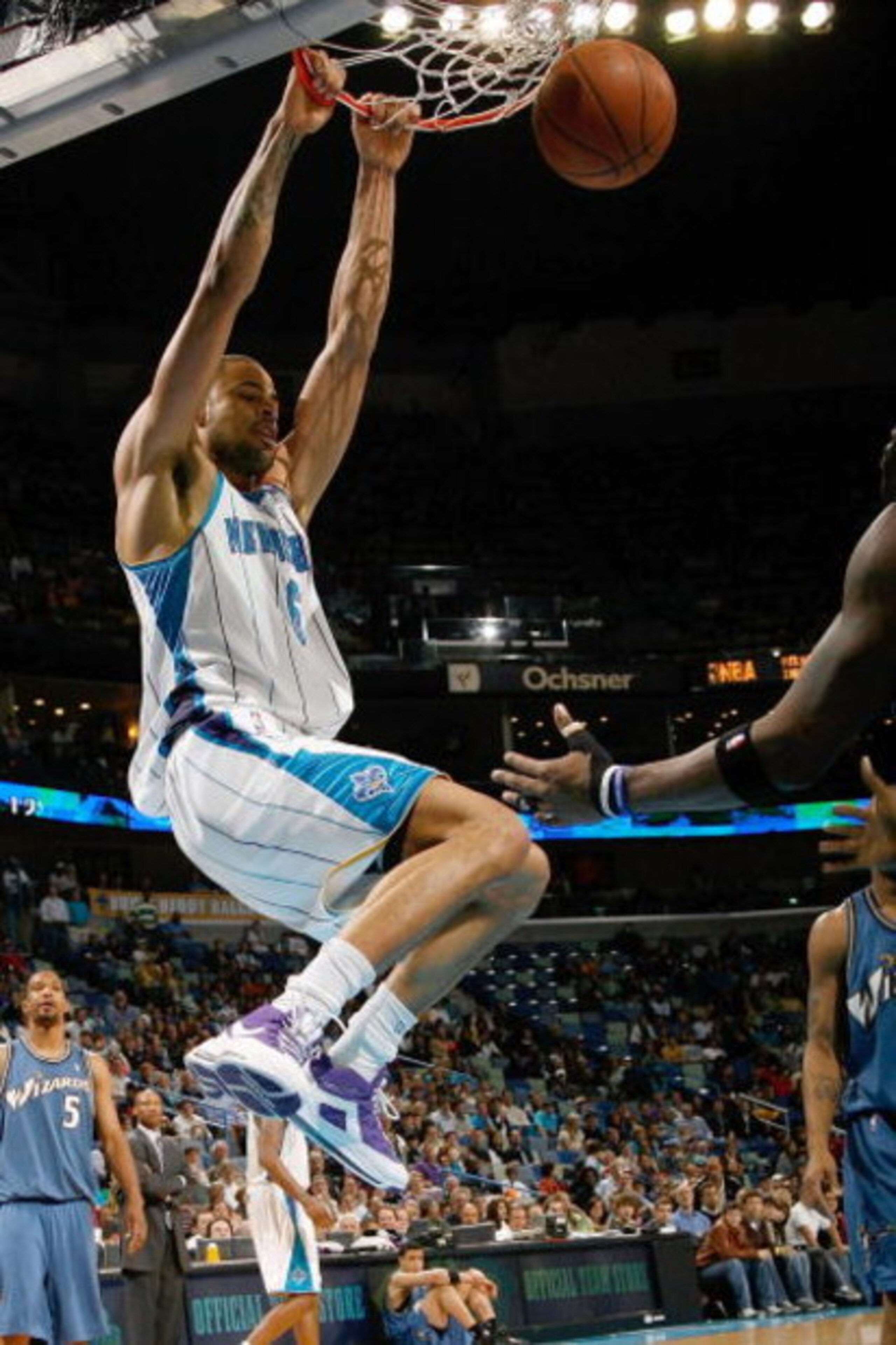 NEW ORLEANS - DECEMBER 30:  Tyson Chandler #6 of the New Orleans Hornets dunks the ball against the Washington Wizards on December 30, 2008 at the New Orleans Arena in New Orleans, Louisiana.  NOTE TO USER: User expressly acknowledges and agrees that, by 