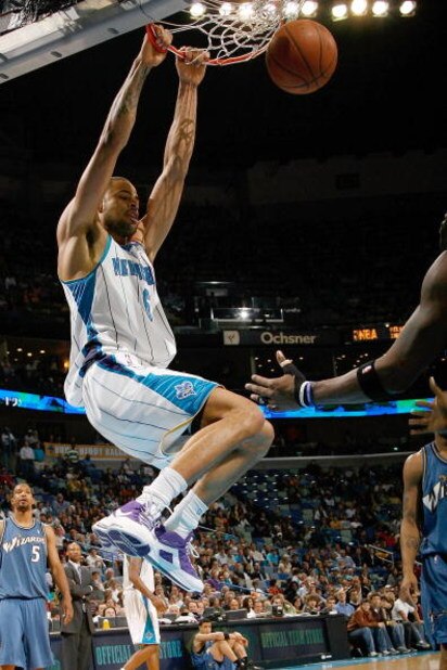 NEW ORLEANS - DECEMBER 30:  Tyson Chandler #6 of the New Orleans Hornets dunks the ball against the Washington Wizards on December 30, 2008 at the New Orleans Arena in New Orleans, Louisiana.  NOTE TO USER: User expressly acknowledges and agrees that, by 