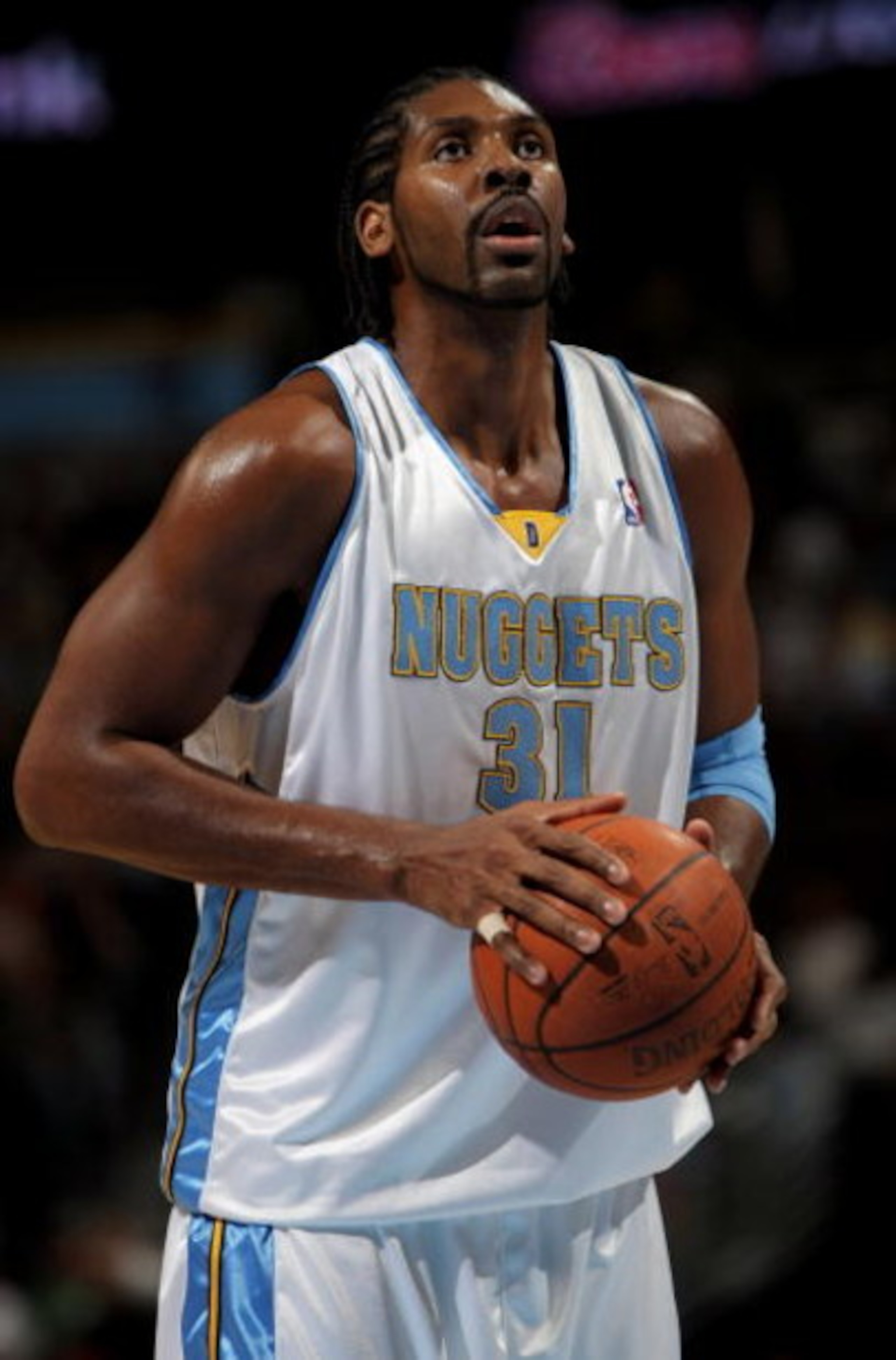 DENVER - NOVEMBER 18:  Nene #31 of the Denver Nuggets takes a free throw against the Milwaukee Bucks at the Pepsi Center on November 18, 2008 in Denver, Colorado. The Nuggets defeated the Bucks 114-105.  (Photo by Doug Pensinger/Getty Images)